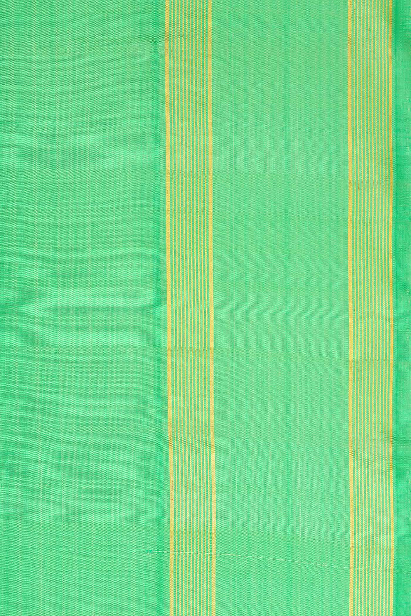 Border image of Pista Green Dual Tone Kanjivaram Silk Saree with Plain Body and Zari Border. 