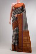 Grey Dual Tone Kanjivaram Silk Saree with Stripes on the body and Plain Border.  displayed on a mannequin
