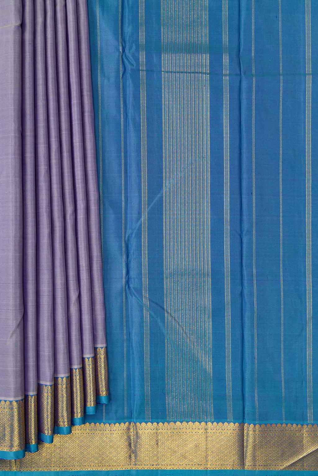 Pleats and pallu of Lavender Dual Tone Kanchipuram Silk Saree with Plain Body and Zari Border. 