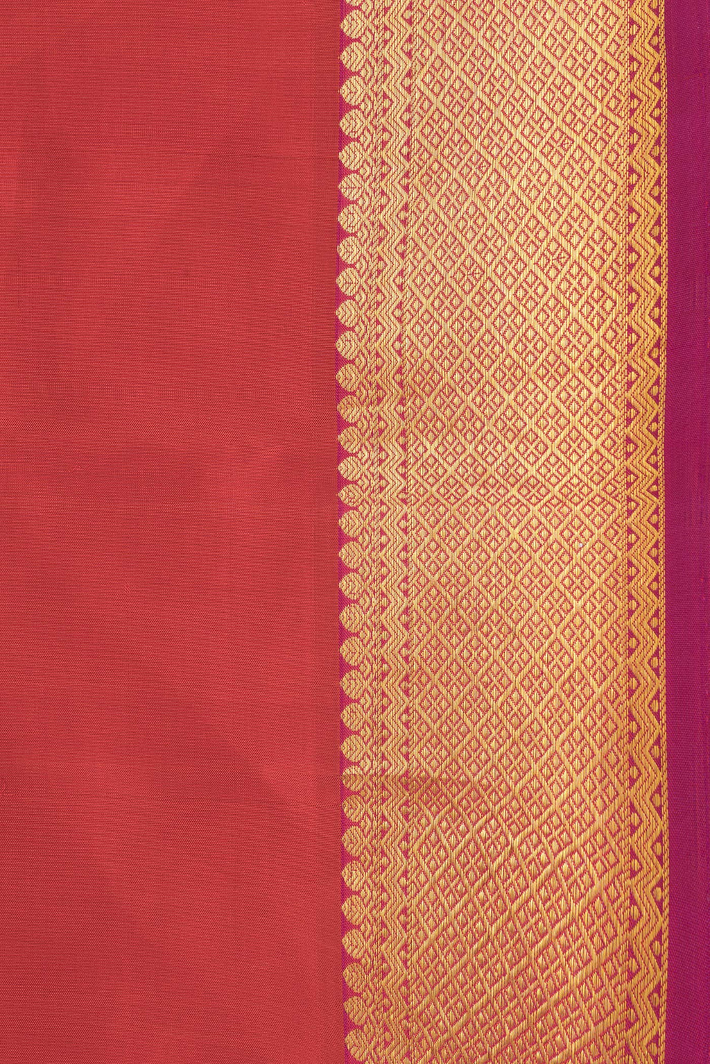 Border image of Orange Dual Tone Kanchipuram Silk Saree with Plain Body and Zari Border. 