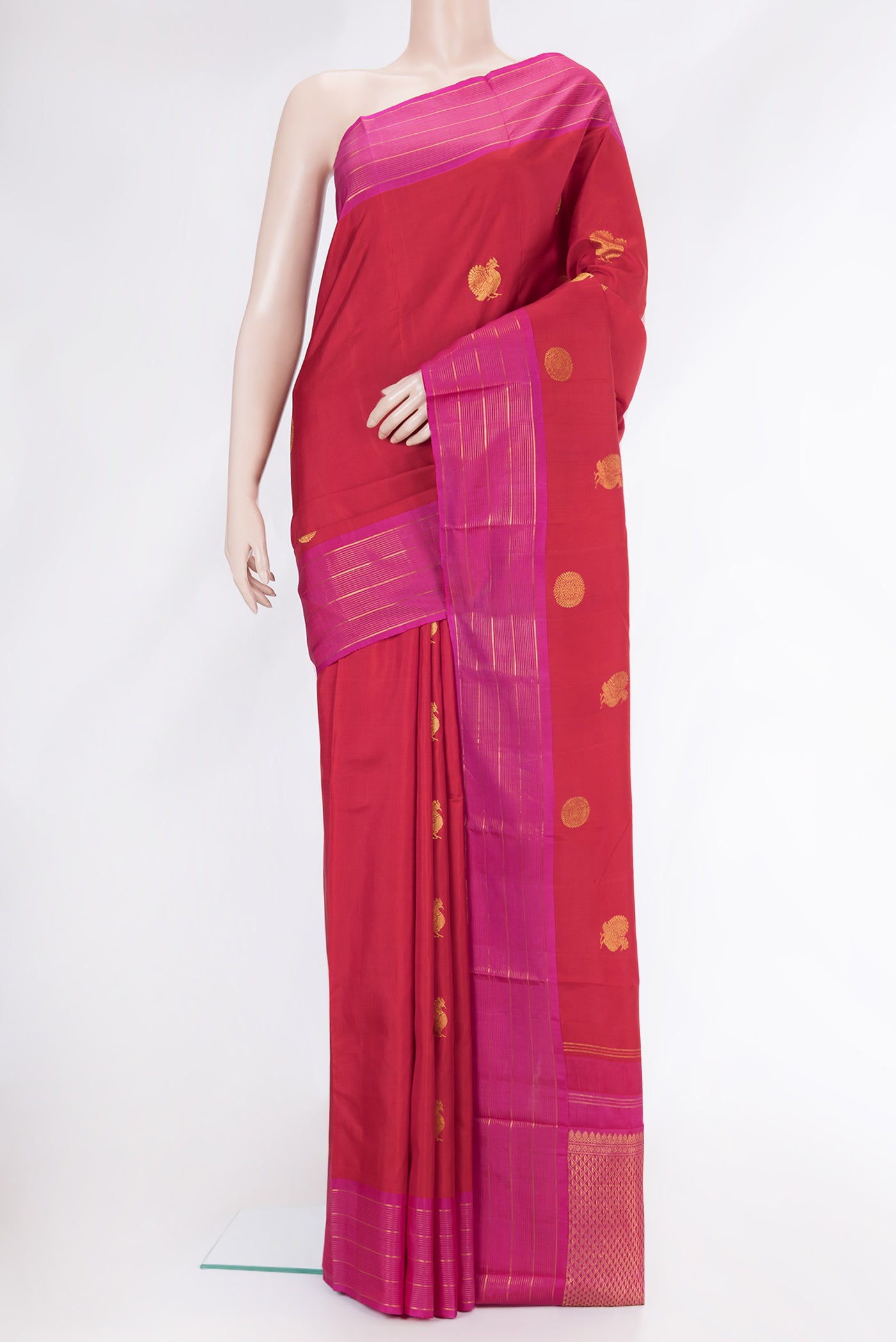 Red Dual Tone Kanchipuram Silk Saree with Zari Butta on the body and Zari Border.  displayed on a mannequin