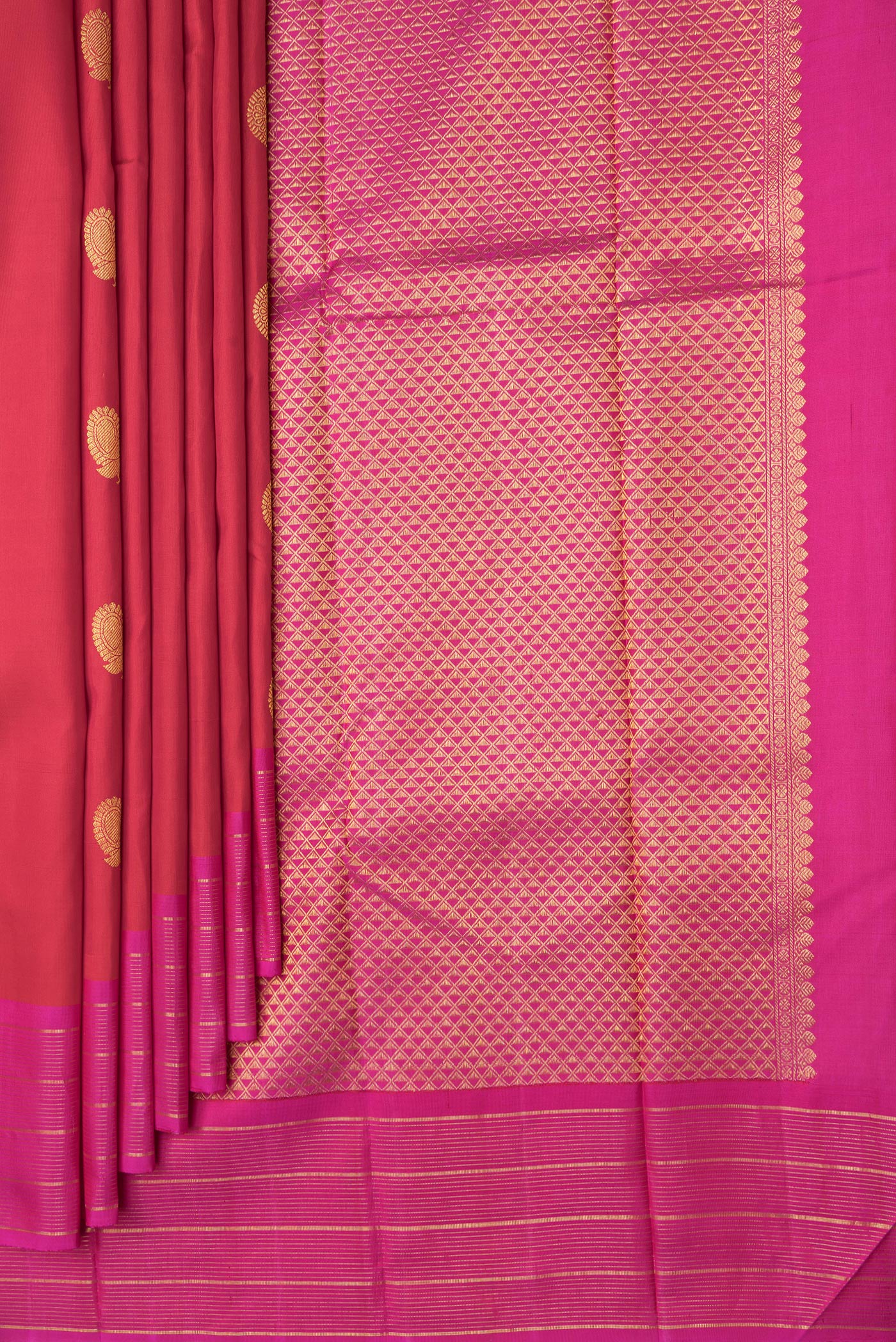 Pleats and pallu of Red Dual Tone Kanchipuram Silk Saree with Zari Butta on the body and Zari Border. 
