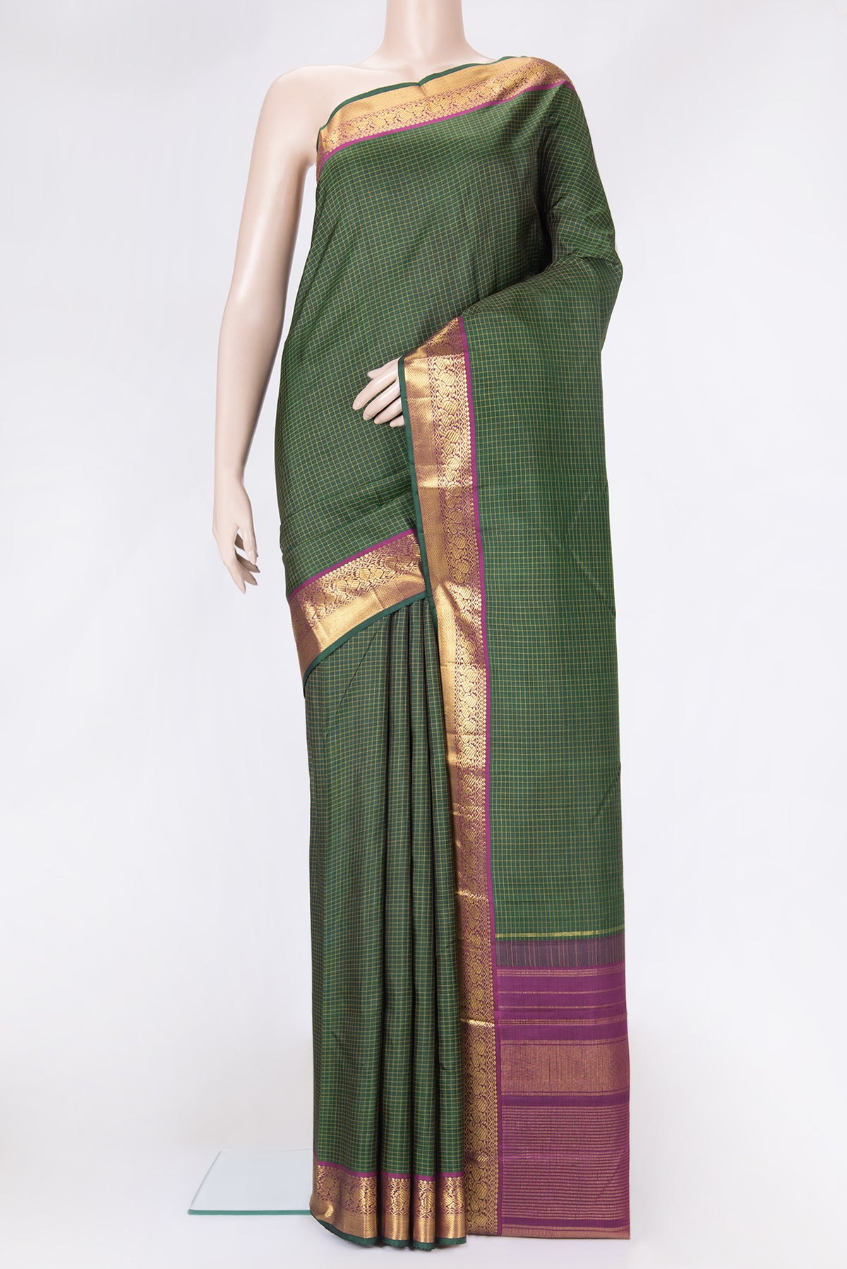 Bottle Green Dual Tone Kanchipuram Silk Saree with Checked design on the body and Zari Border.  displayed on a mannequin