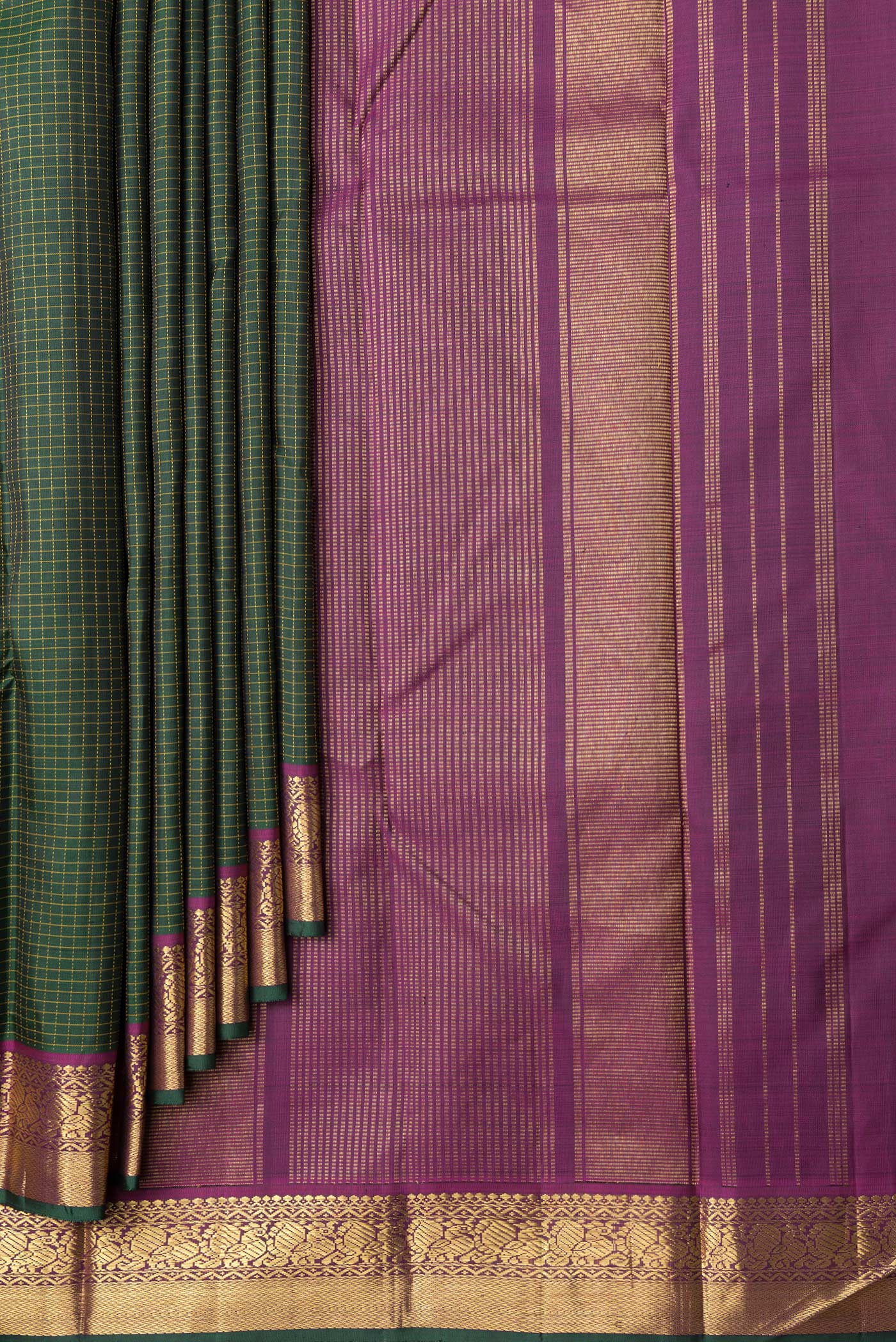 Pleats and pallu of Bottle Green Dual Tone Kanchipuram Silk Saree with Checked design on the body and Zari Border. 