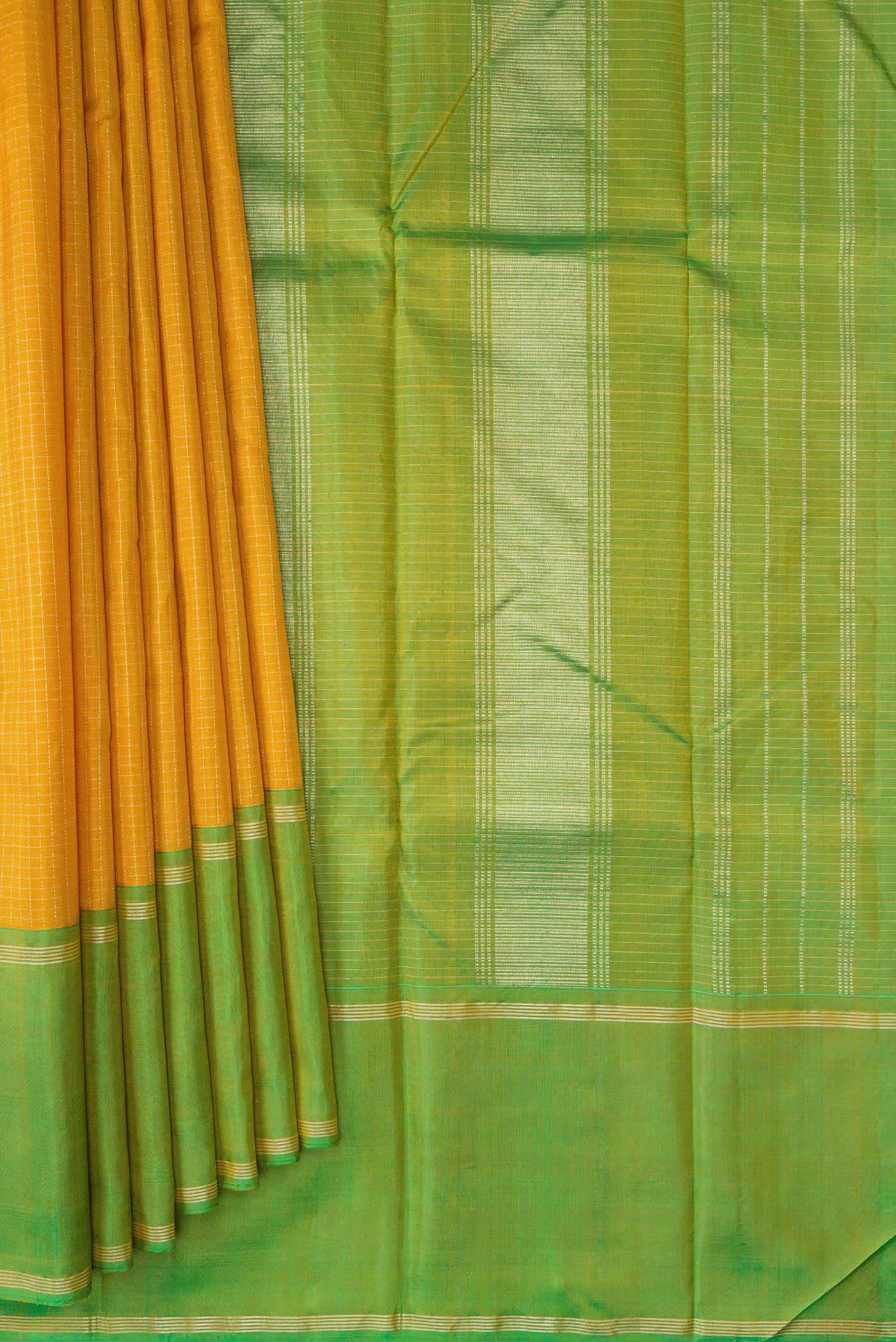Pleats and pallu of Mustard Dual Tone Kanchipuram Silk Saree with Checked design on the body and Zari Border. 