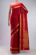 Maroon Kanchipuram Silk Saree with Stripes on the body and Zari Border displayed on a mannequin