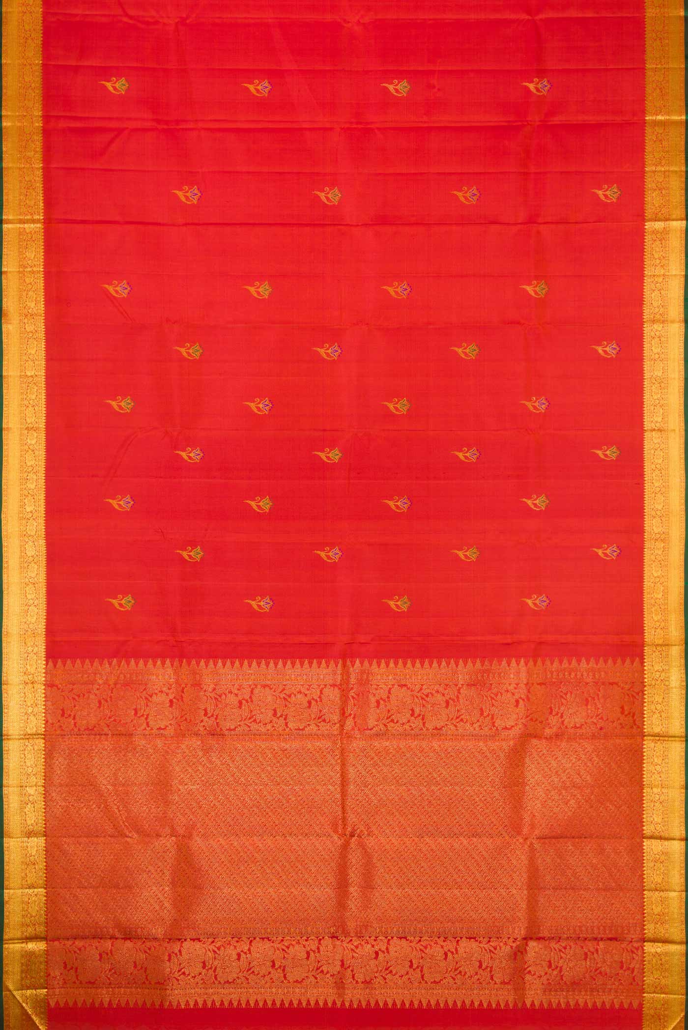 Flat view of Orange Dual Tone Kanchipuram Silk Saree with Zari And Thread Butta on the body and Zari Border. 