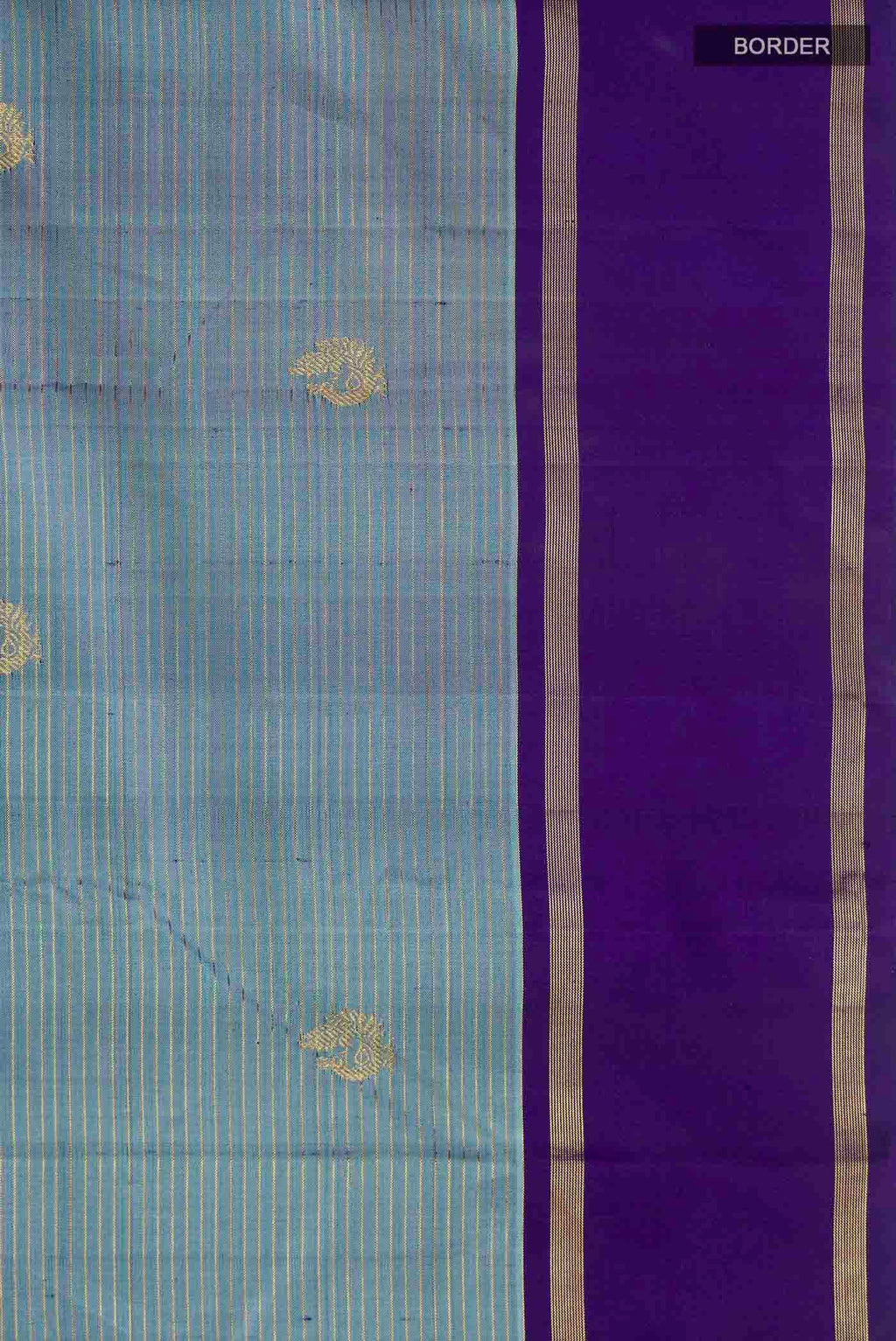 Border image of Blue Kanchipuram Silk Saree with Zari Butta on the body and Zari Border