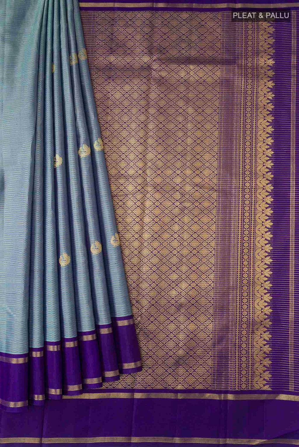 Pleats and pallu of Blue Kanchipuram Silk Saree with Zari Butta on the body and Zari Border