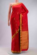 Red Kanchipuram Silk Saree with Stripes on the body and Zari Border displayed on a mannequin