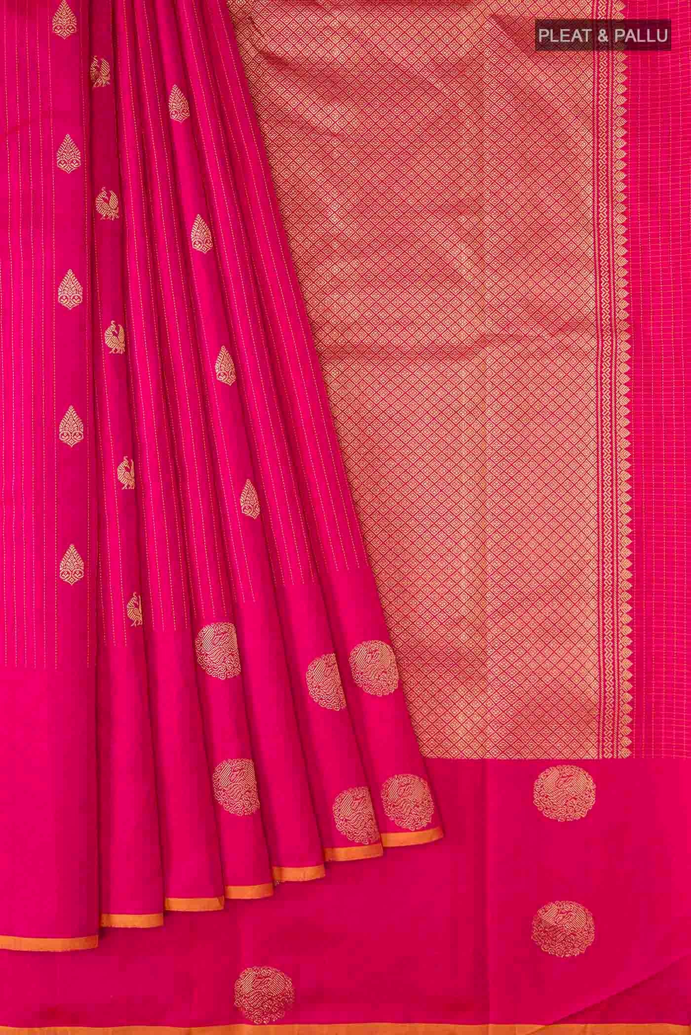 Pleats and pallu of Pink Kanchipuram Silk Saree with Zari Butta on the body and Plain Border