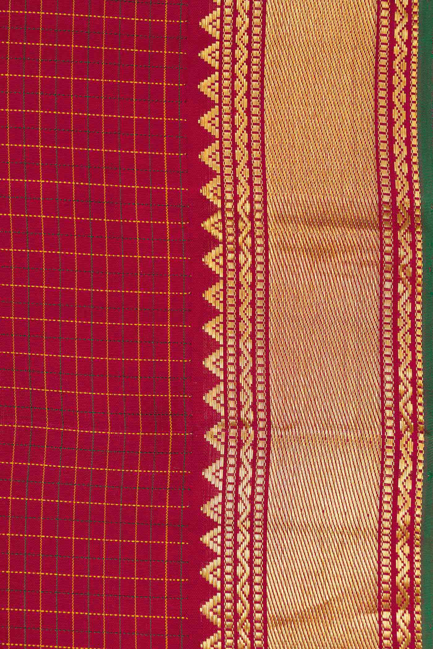 Border image of Maroon Dual Tone Kanchipuram Silk Saree with Checked design on the body and Zari Border. 