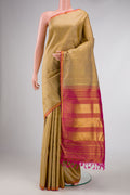 Beige Dual Tone Kanchipuram Silk Saree with Zari Butta on the body and Zari Border displayed on a mannequin