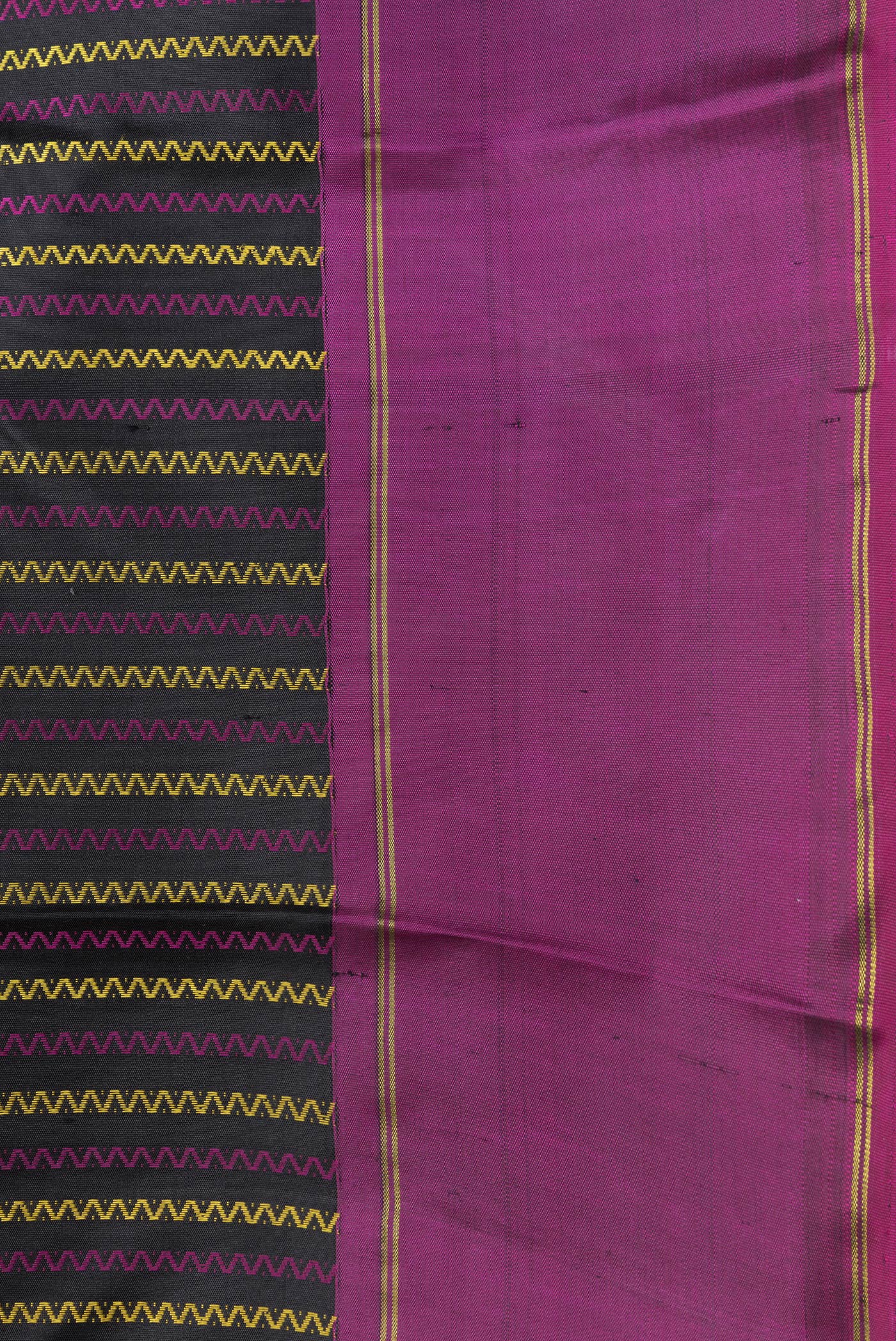 Border image of Black Dual Tone Kanchipuram Silk Saree with Stripes on the body and Ganga Jamuna Border. 