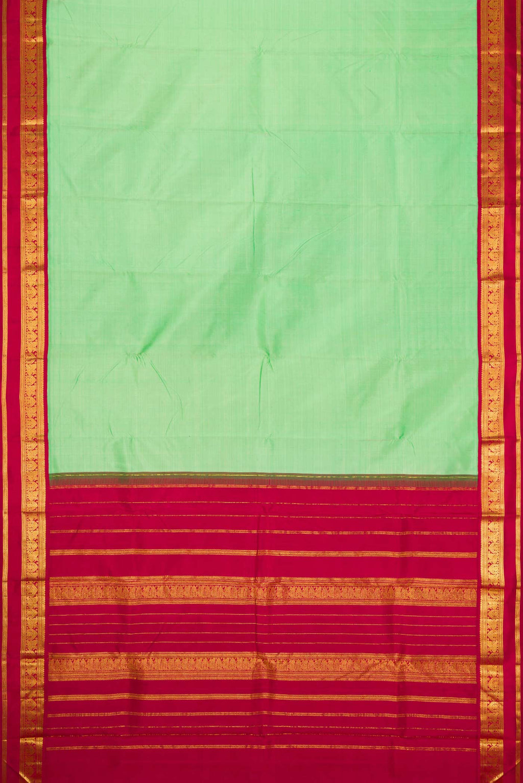 Flat view of Pista Green Dual Tone Kanjivaram Silk Saree with Plain Body and Zari Border. 