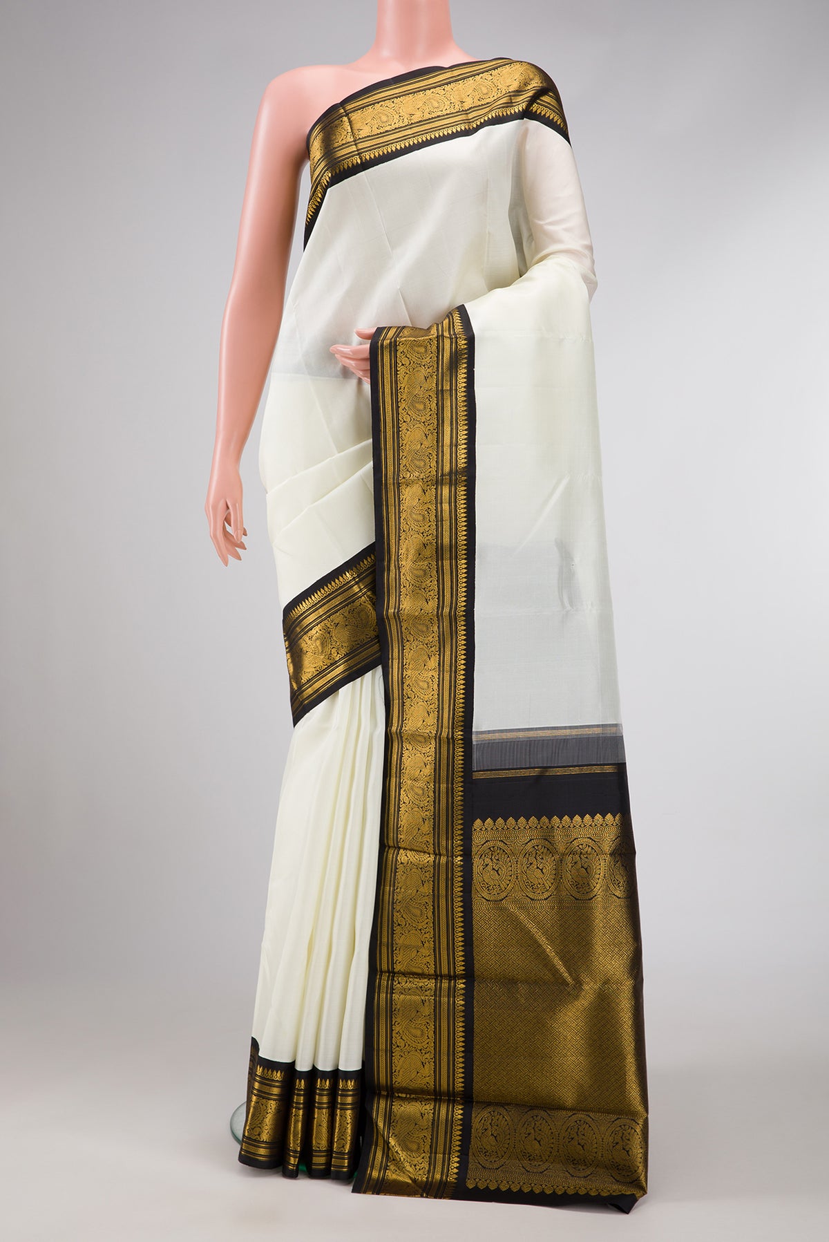 Pure Silk Pure Zari White Dual Tone Kanjivaram Saree with Plain Body and Zari Border.  displayed on a mannequin