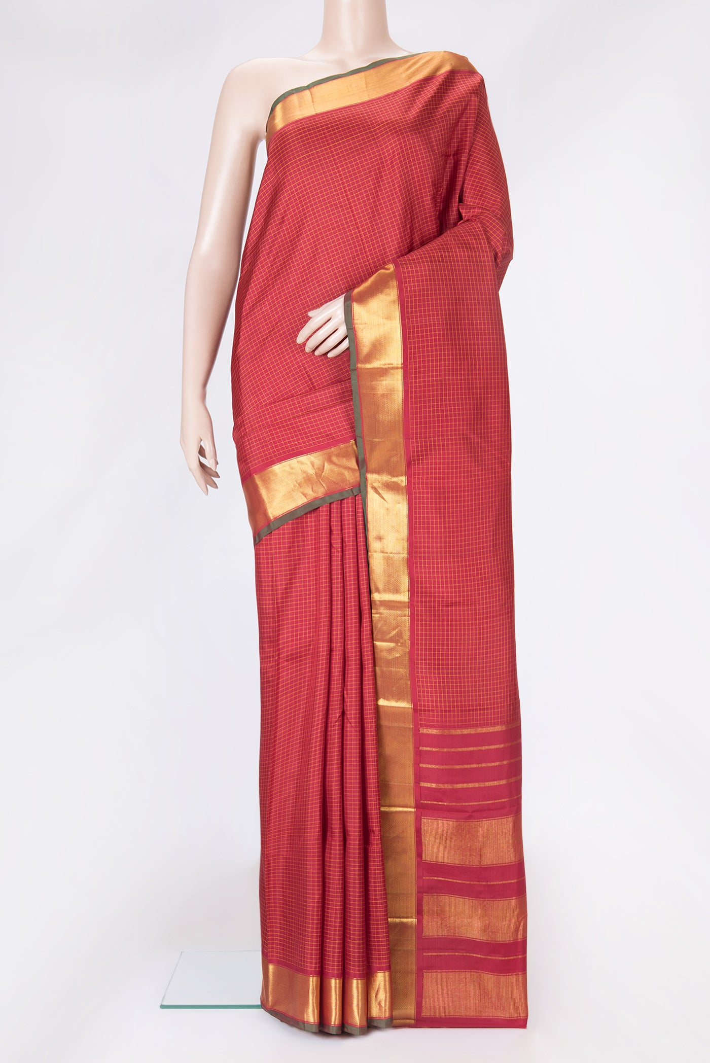 Maroon Dual Tone Kanchipuram Silk Saree with Checked design on the body and Zari Border.  displayed on a mannequin