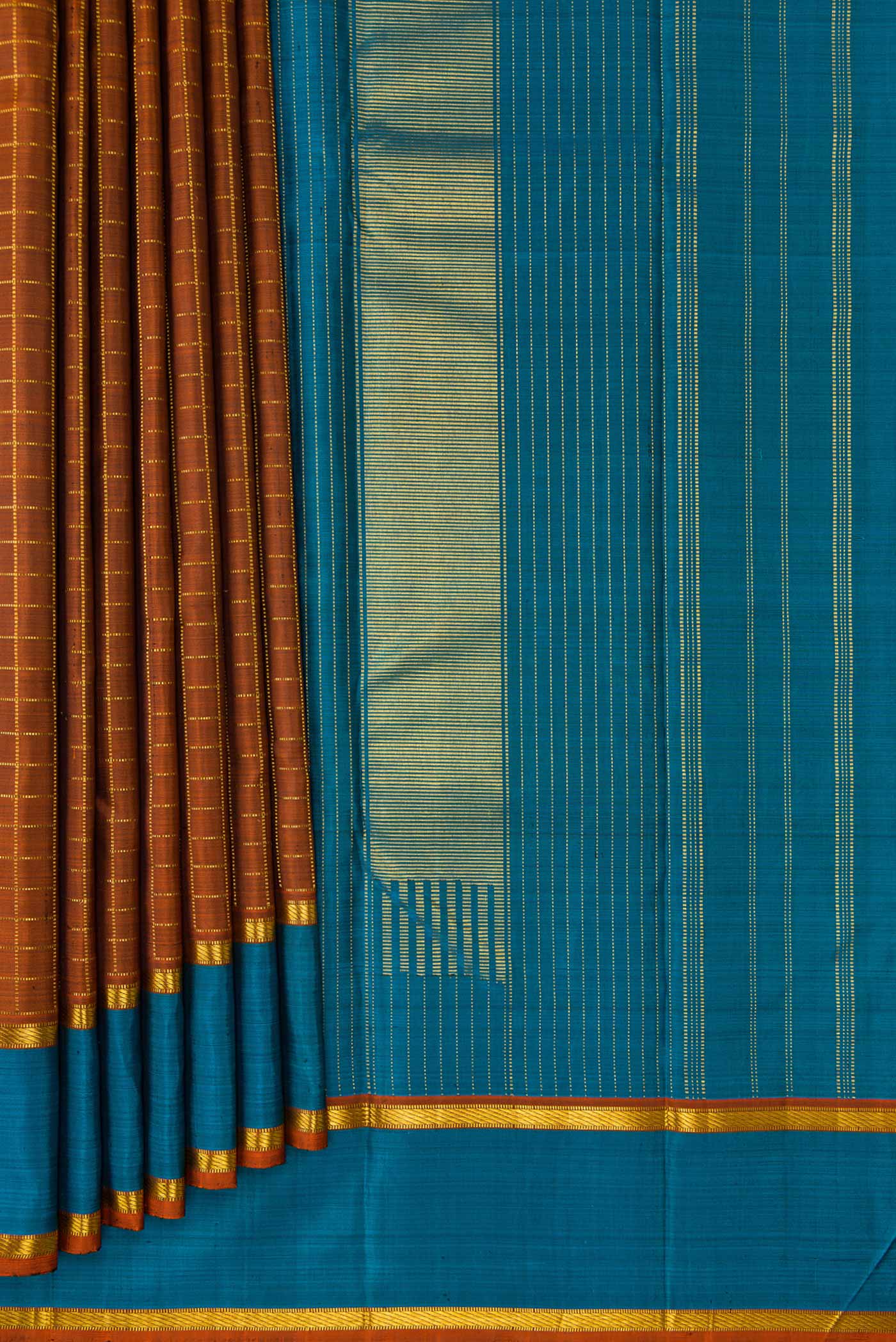 Pleats and pallu of Brown Dual Tone Kanjivaram Silk Saree with Checked design on the body and Zari Border. 