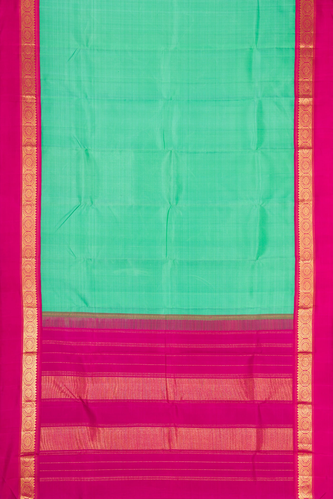 Flat view of Pure Silk Pure Zari Sea Green Dual Tone Kanjivaram Saree with Plain Body and Zari Border. 