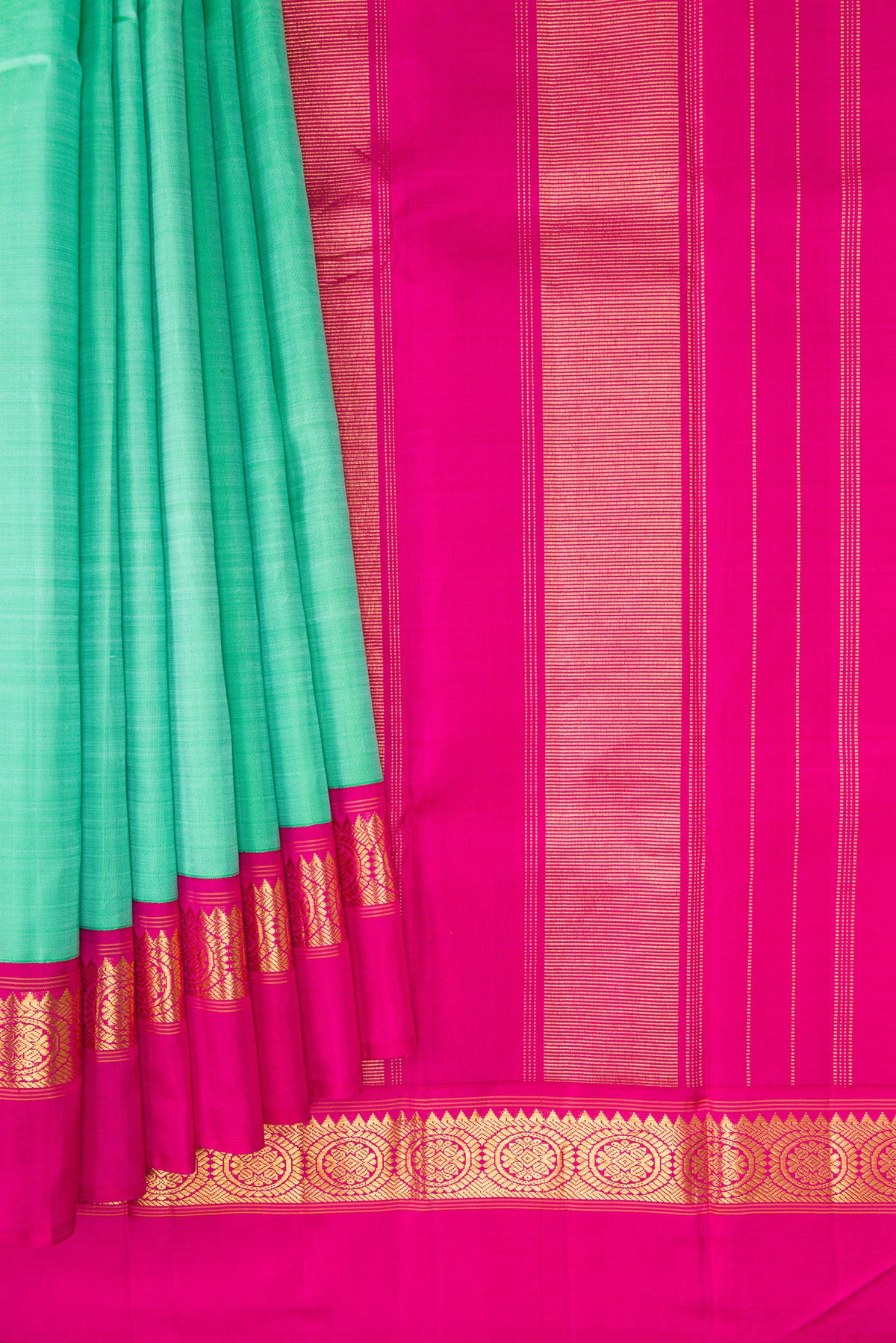 Pleats and pallu of Pure Silk Pure Zari Sea Green Dual Tone Kanjivaram Saree with Plain Body and Zari Border. 