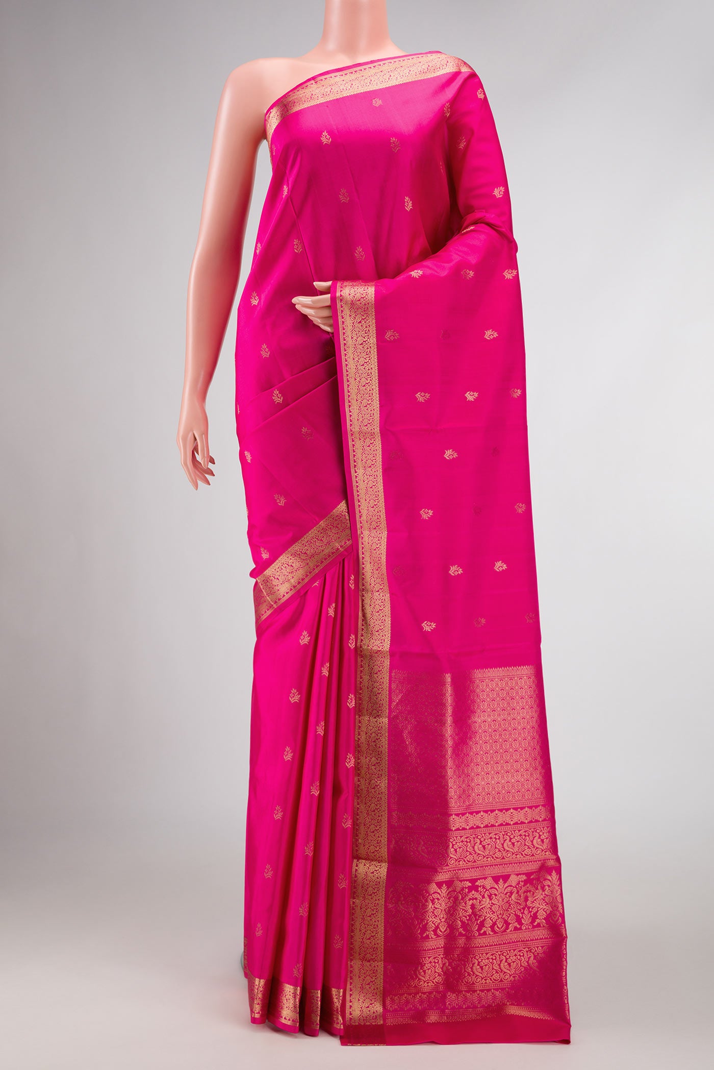 Dark Pink Dual Tone Soft Silk Saree with Zari Butta on the body and Zari Border displayed on a mannequin
