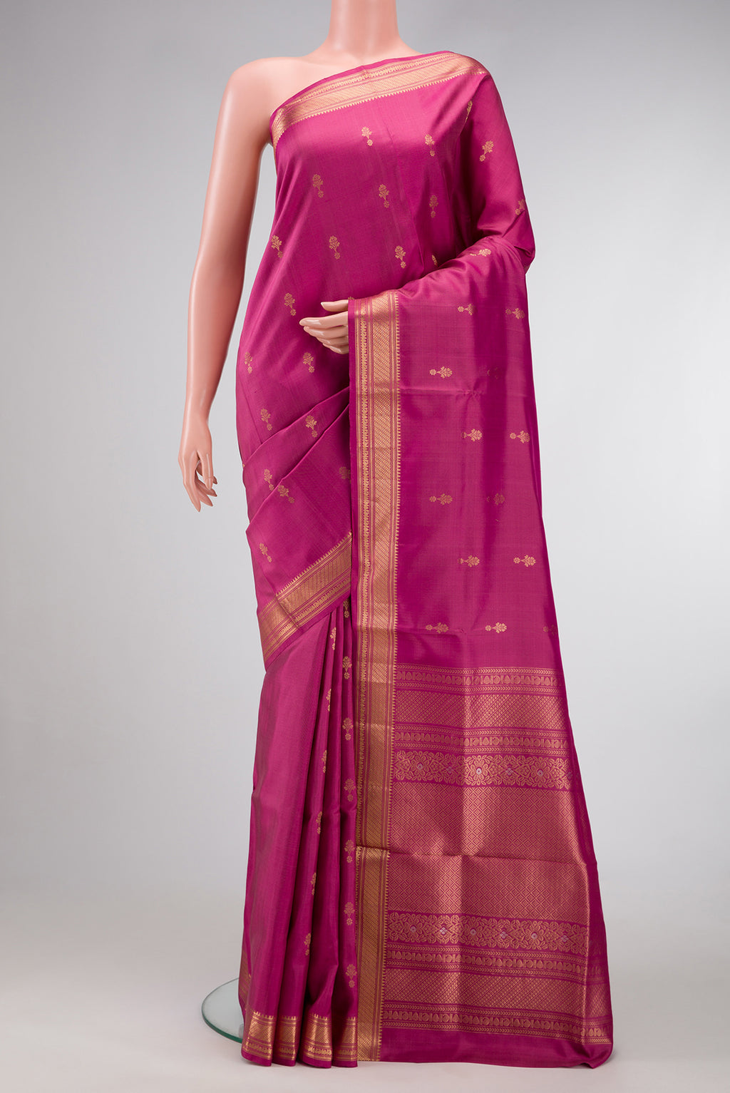 Pink Dual Tone Soft Silk Saree with Zari Butta on the body and Zari Border.  displayed on a mannequin