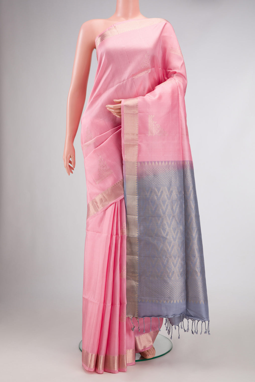 Pink Dual Tone Soft Silk Saree with Zari Butta on the body and Zari Border.  displayed on a mannequin