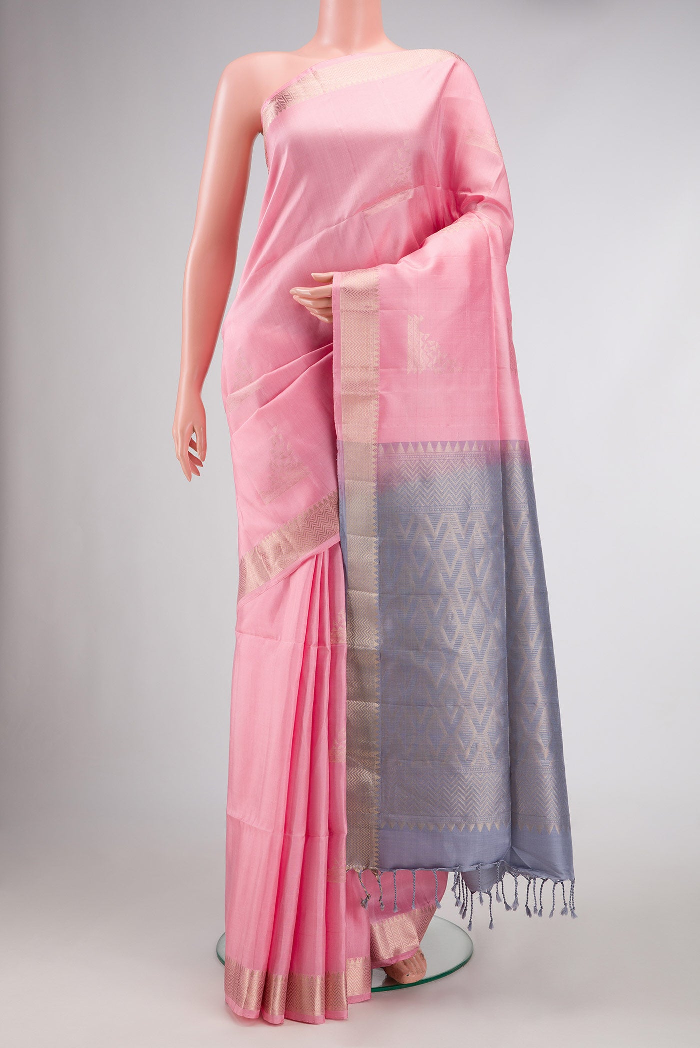 Pink Dual Tone Soft Silk Saree with Zari Butta on the body and Zari Border.  displayed on a mannequin