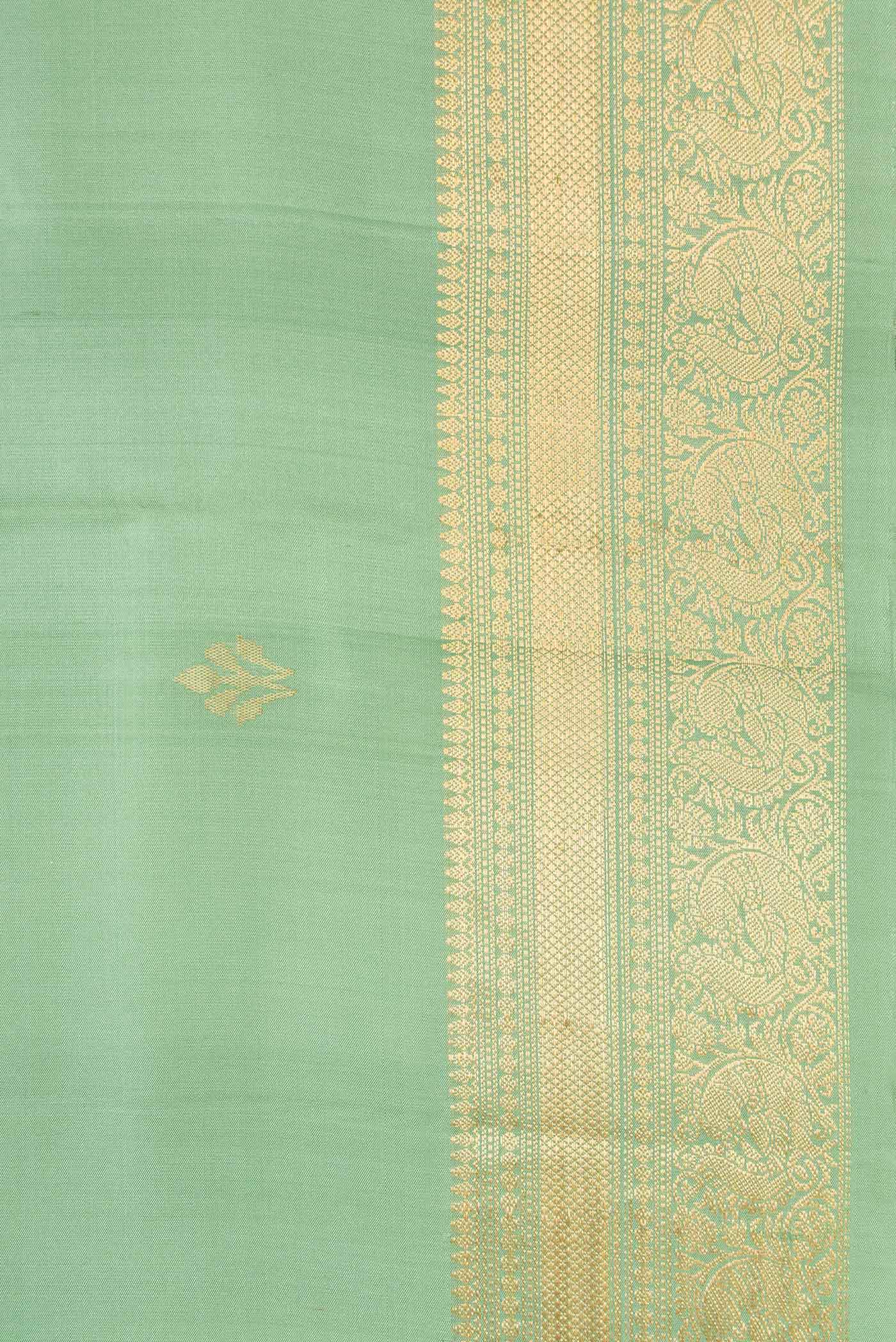 Border image of Pista Green Dual Tone Soft Silk Saree with Zari Butta on the body and Zari Border. 