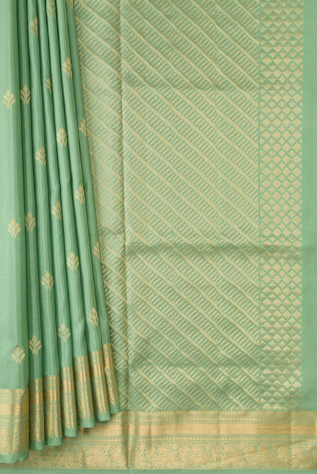 Pleats and pallu of Pista Green Dual Tone Soft Silk Saree with Zari Butta on the body and Zari Border. 