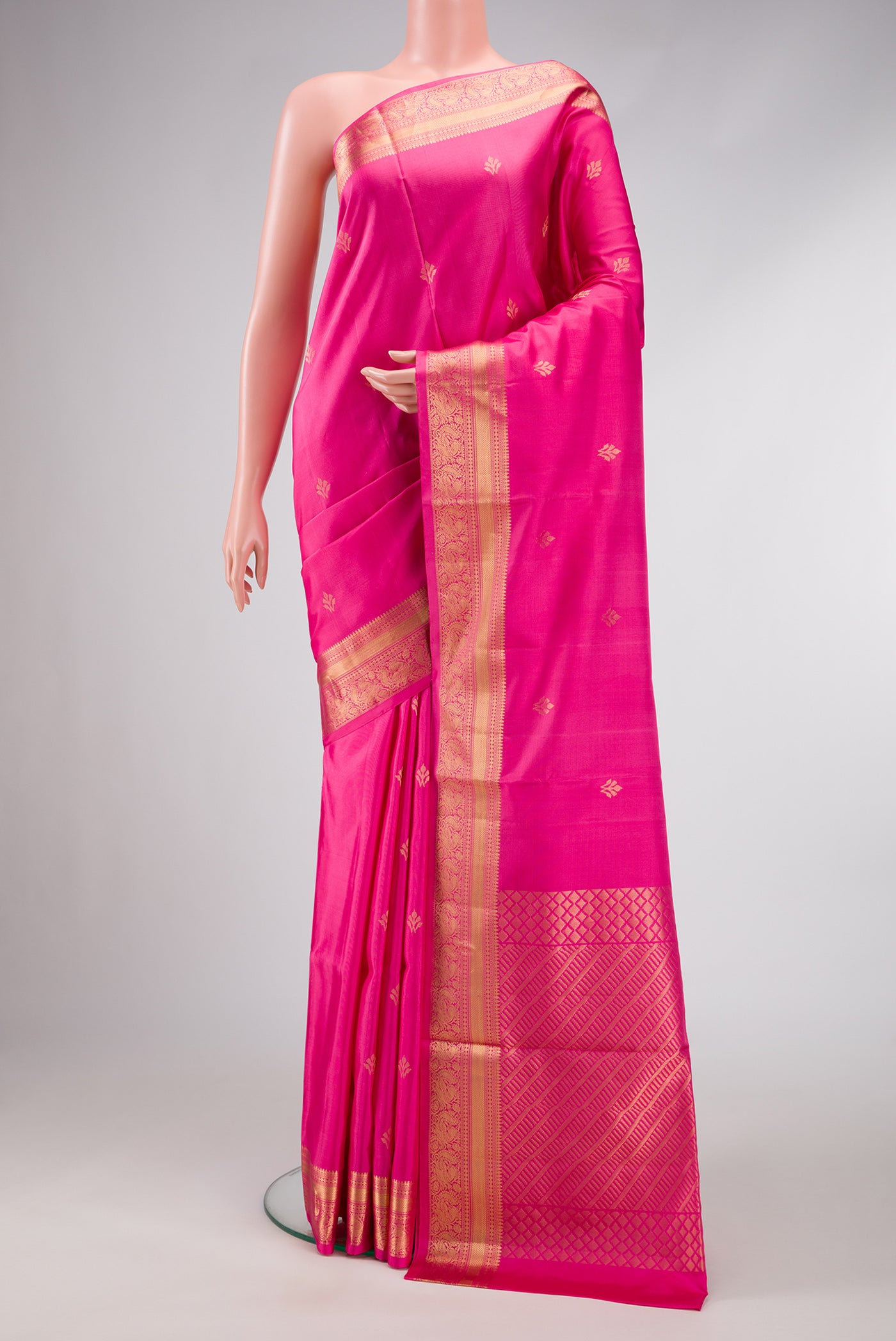 Pink Dual Tone Soft Silk Saree with Zari Butta on the body and Zari Border.  displayed on a mannequin