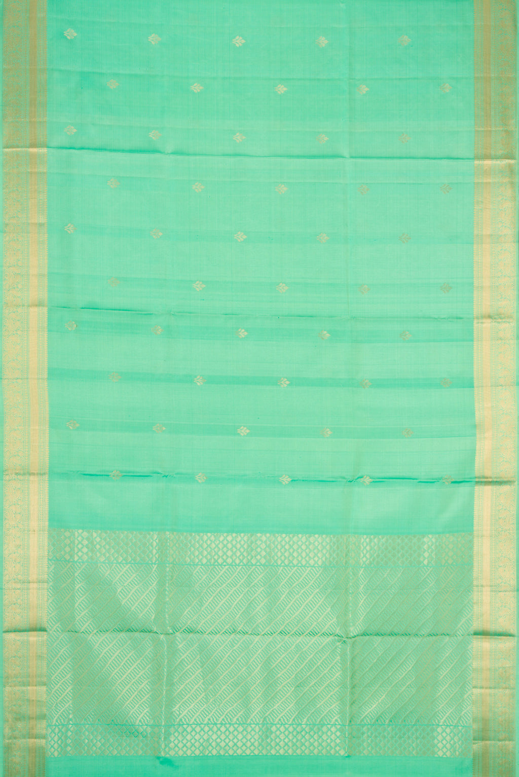 Flat view of Parrot Green Dual Tone Soft Silk Saree with Zari Butta on the body and Zari Border. 