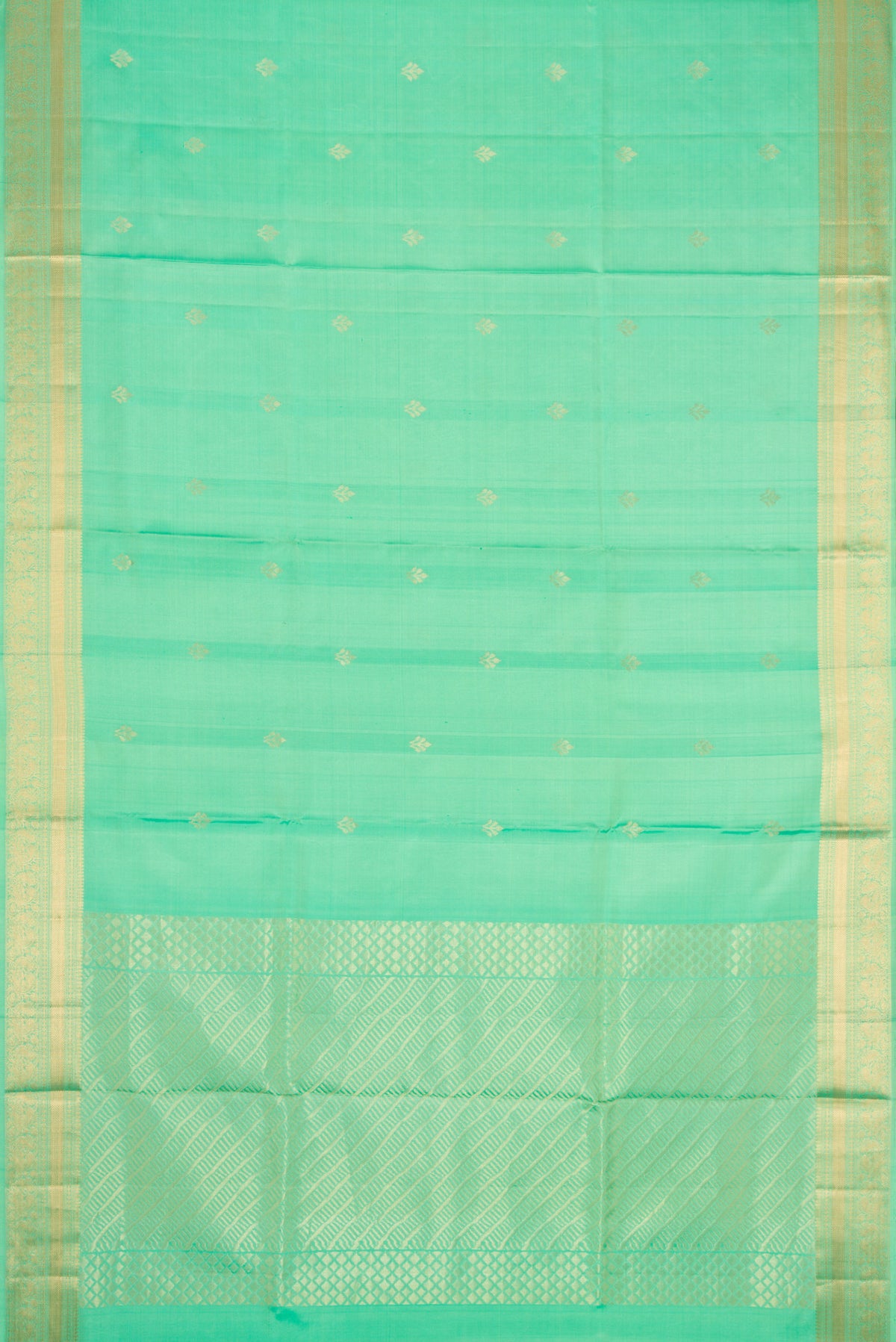 Flat view of Parrot Green Dual Tone Soft Silk Saree with Zari Butta on the body and Zari Border. 