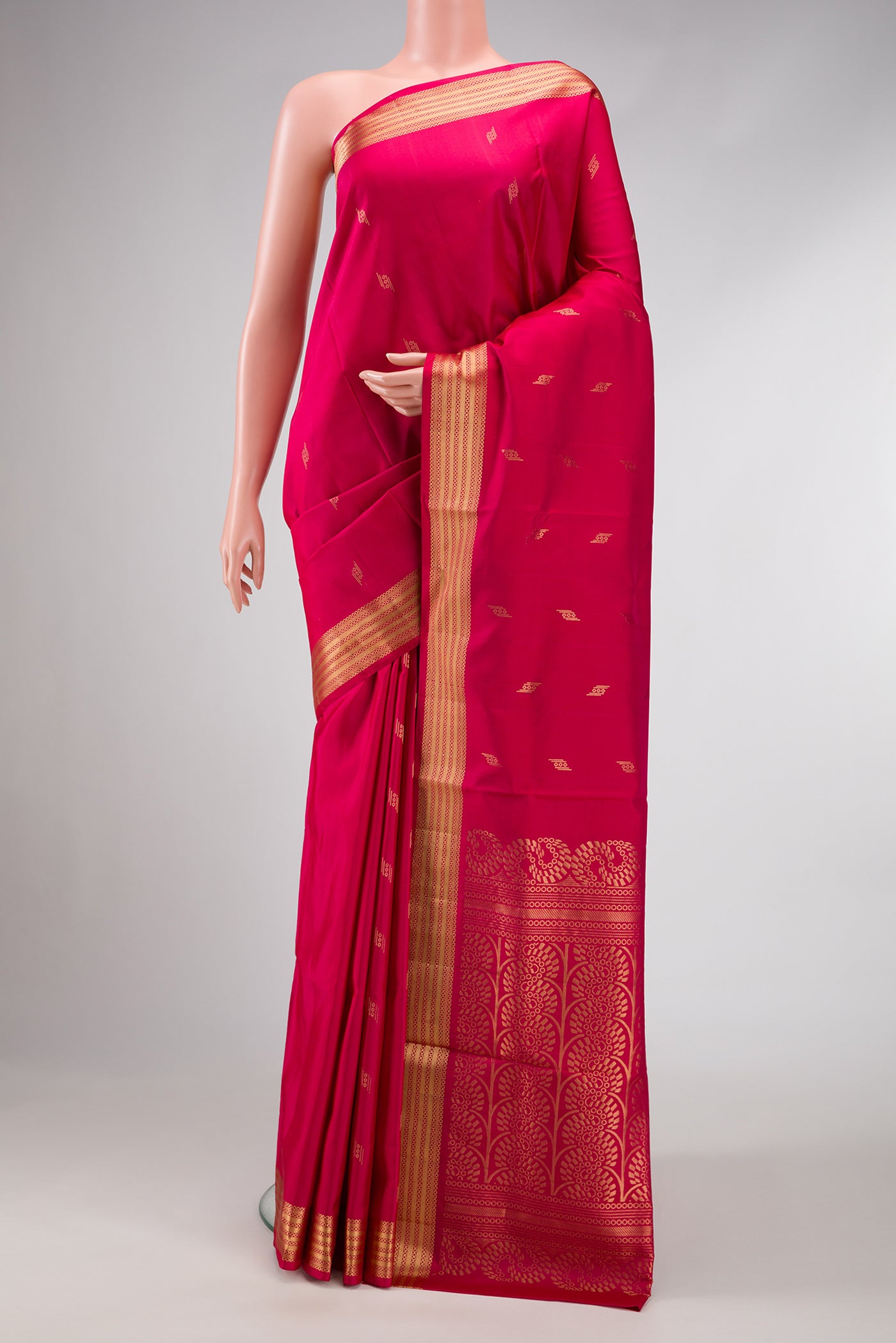 Dark Pink Dual Tone Soft Silk Saree with Zari Butta on the body and Zari Border.  displayed on a mannequin