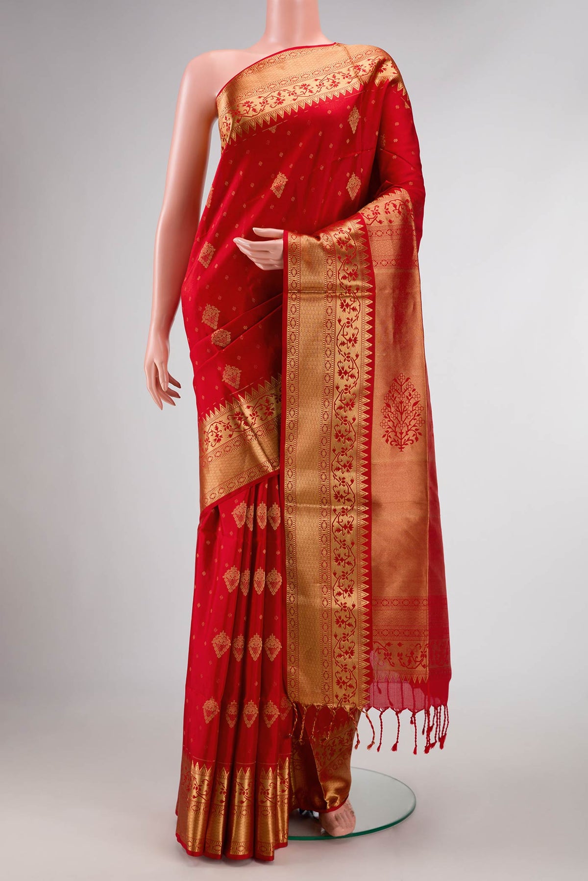Red Dual Tone Soft Silk Saree with Zari Butta on the body and Zari Border displayed on a mannequin