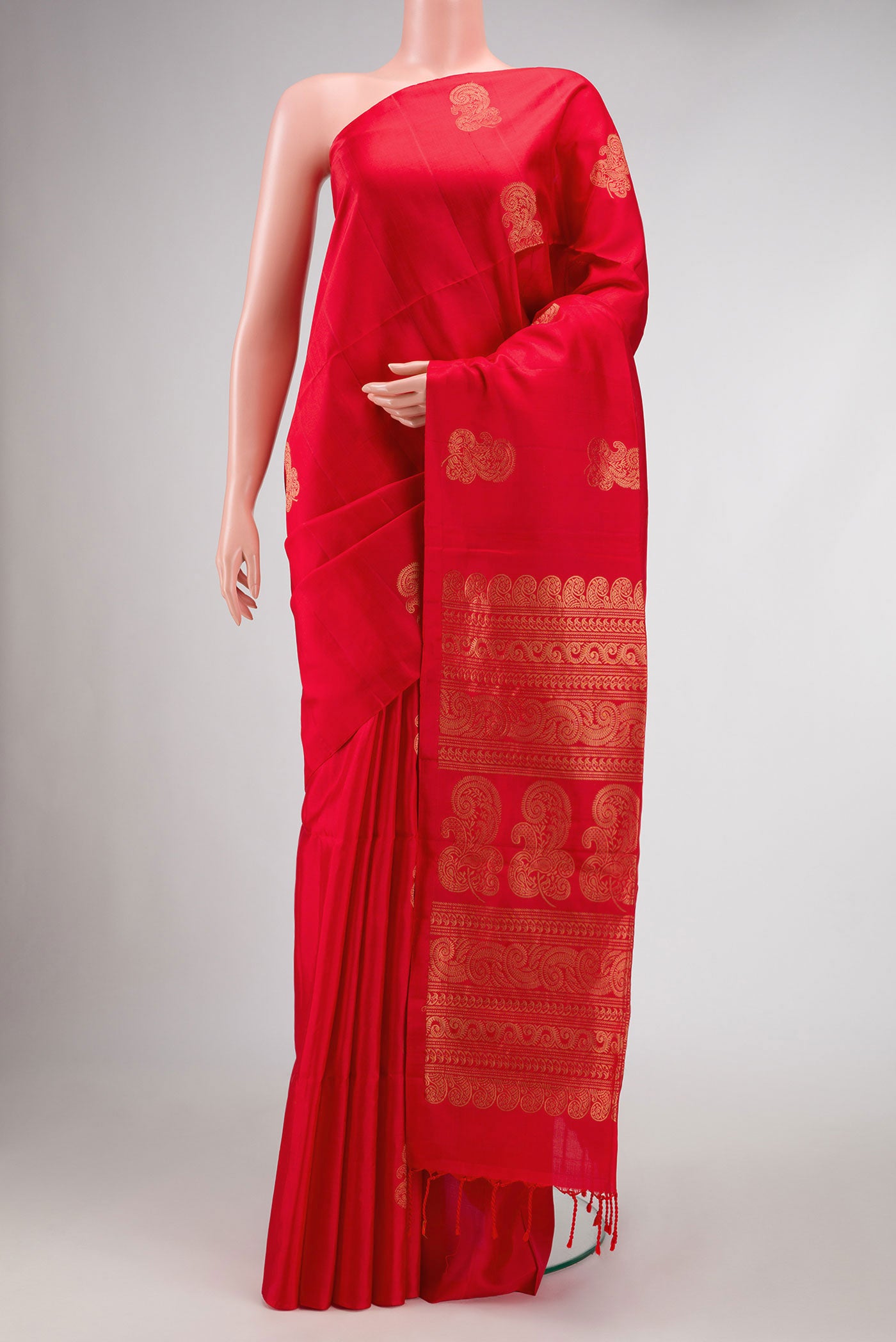 Red Dual Tone Soft Silk Saree with Zari Butta on the body and Without Border.  displayed on a mannequin