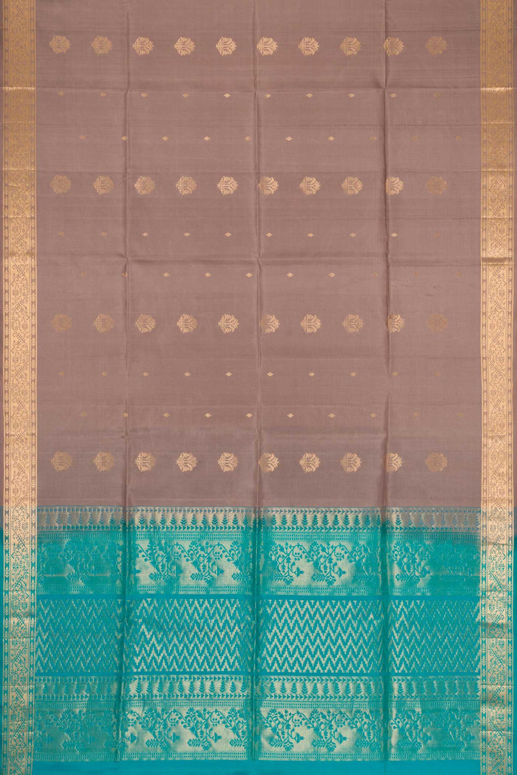 Flat view of Brown Dual Tone Soft Silk Saree with Zari Butta on the body and Zari Border. 