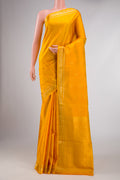 Yellow Dual Tone Soft Silk Saree with Zari Butta on the body and Zari Border displayed on a mannequin