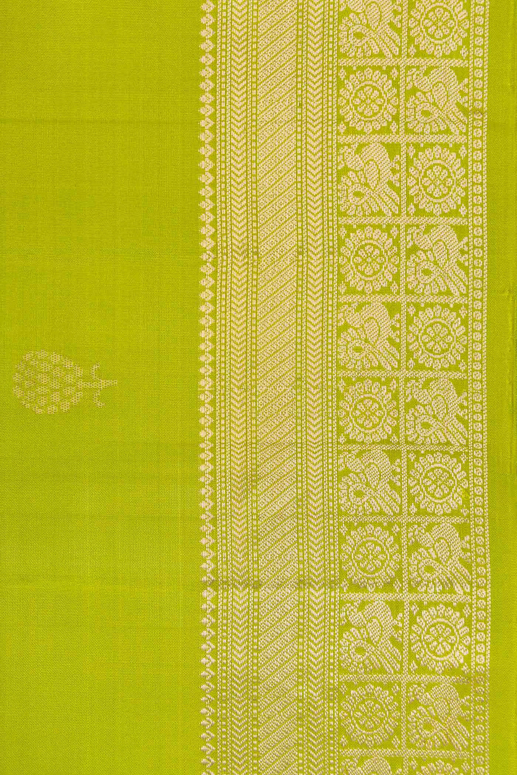 Border image of Parrot Green Dual Tone Soft Silk Saree with Zari Butta on the body and Zari Border. 