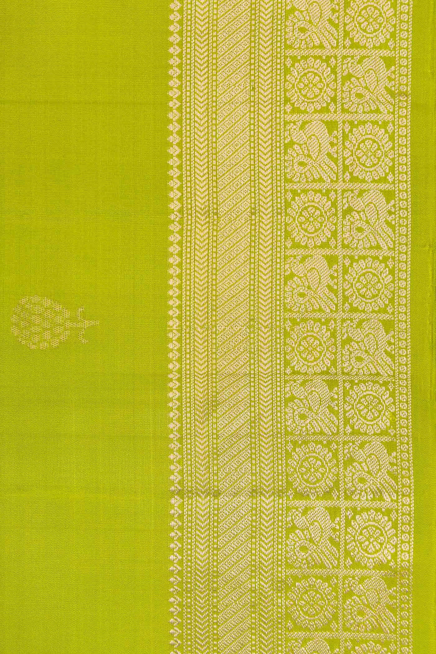 Border image of Parrot Green Dual Tone Soft Silk Saree with Zari Butta on the body and Zari Border. 