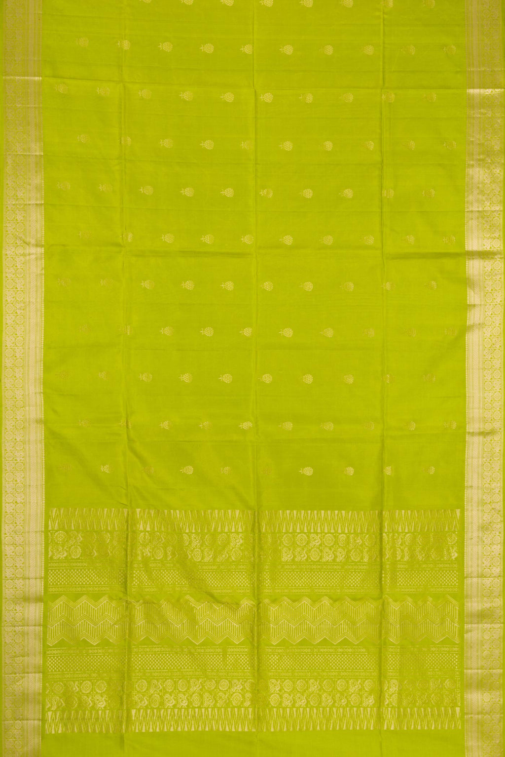 Flat view of Parrot Green Dual Tone Soft Silk Saree with Zari Butta on the body and Zari Border. 