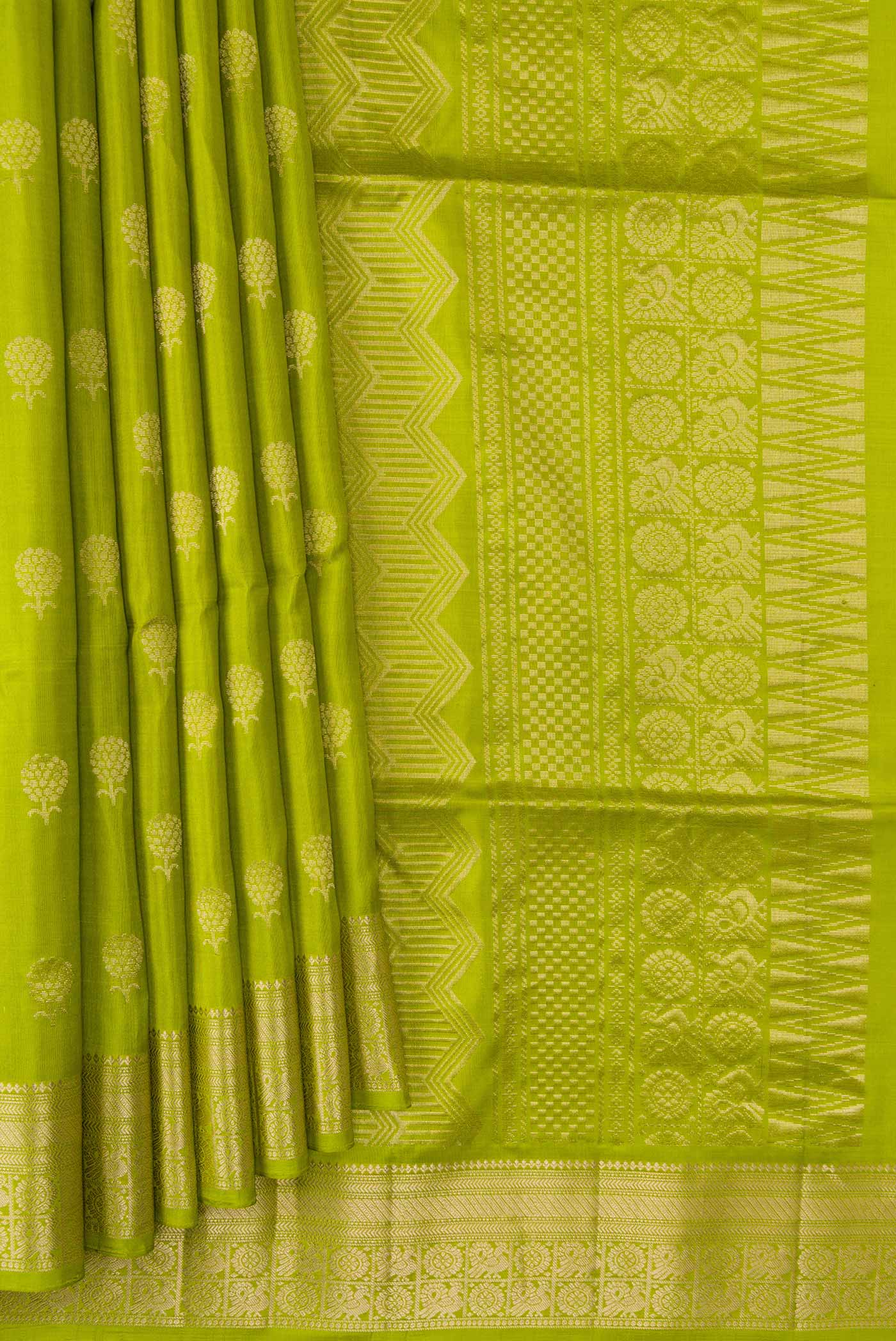 Pleats and pallu of Parrot Green Dual Tone Soft Silk Saree with Zari Butta on the body and Zari Border. 