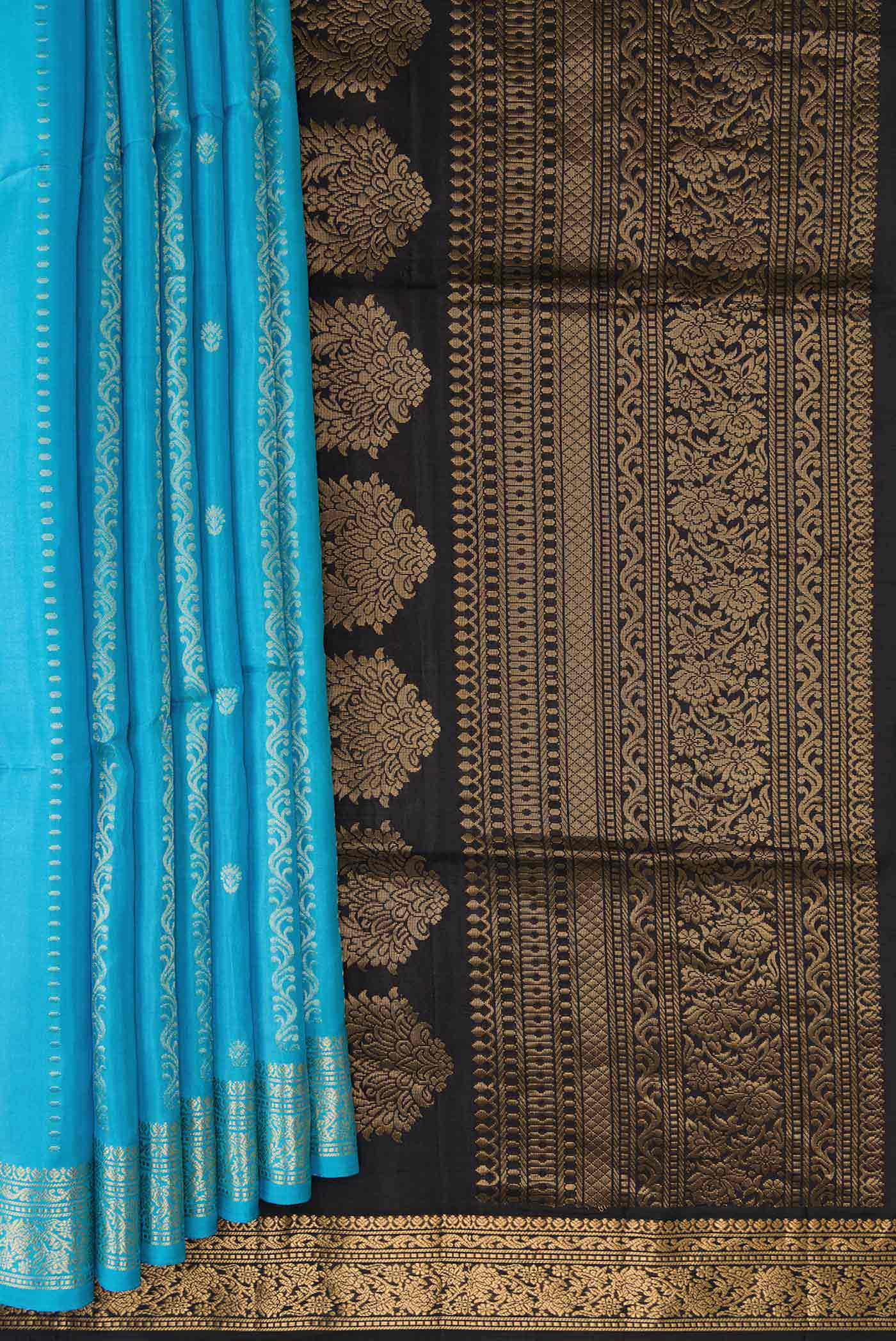 Pleats and pallu of Sky Blue Dual Tone Soft Silk Saree with Stripes on the body and Zari Border. 