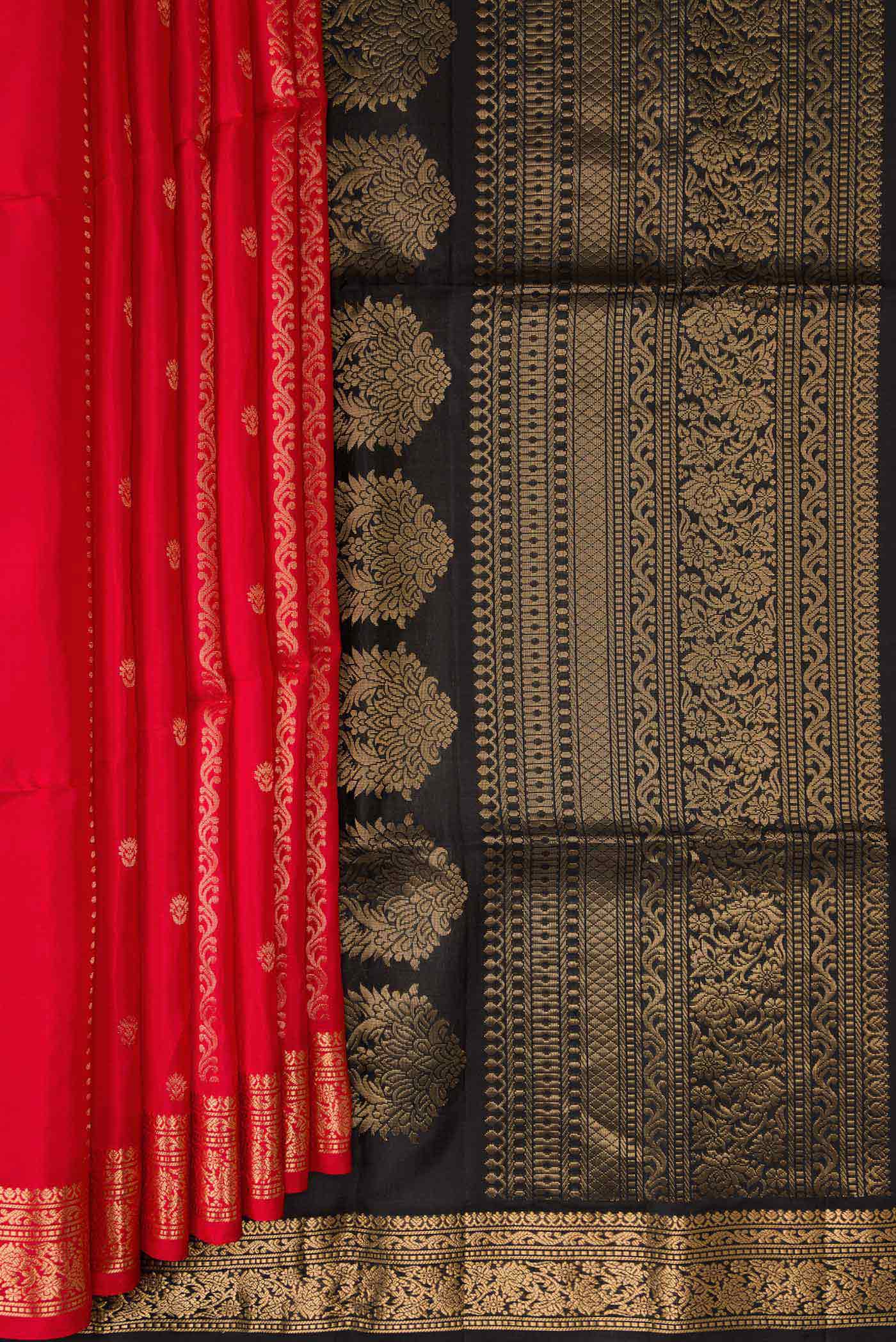 Pleats and pallu of Red Dual Tone Soft Silk Saree with Stripes on the body and Zari Border. 