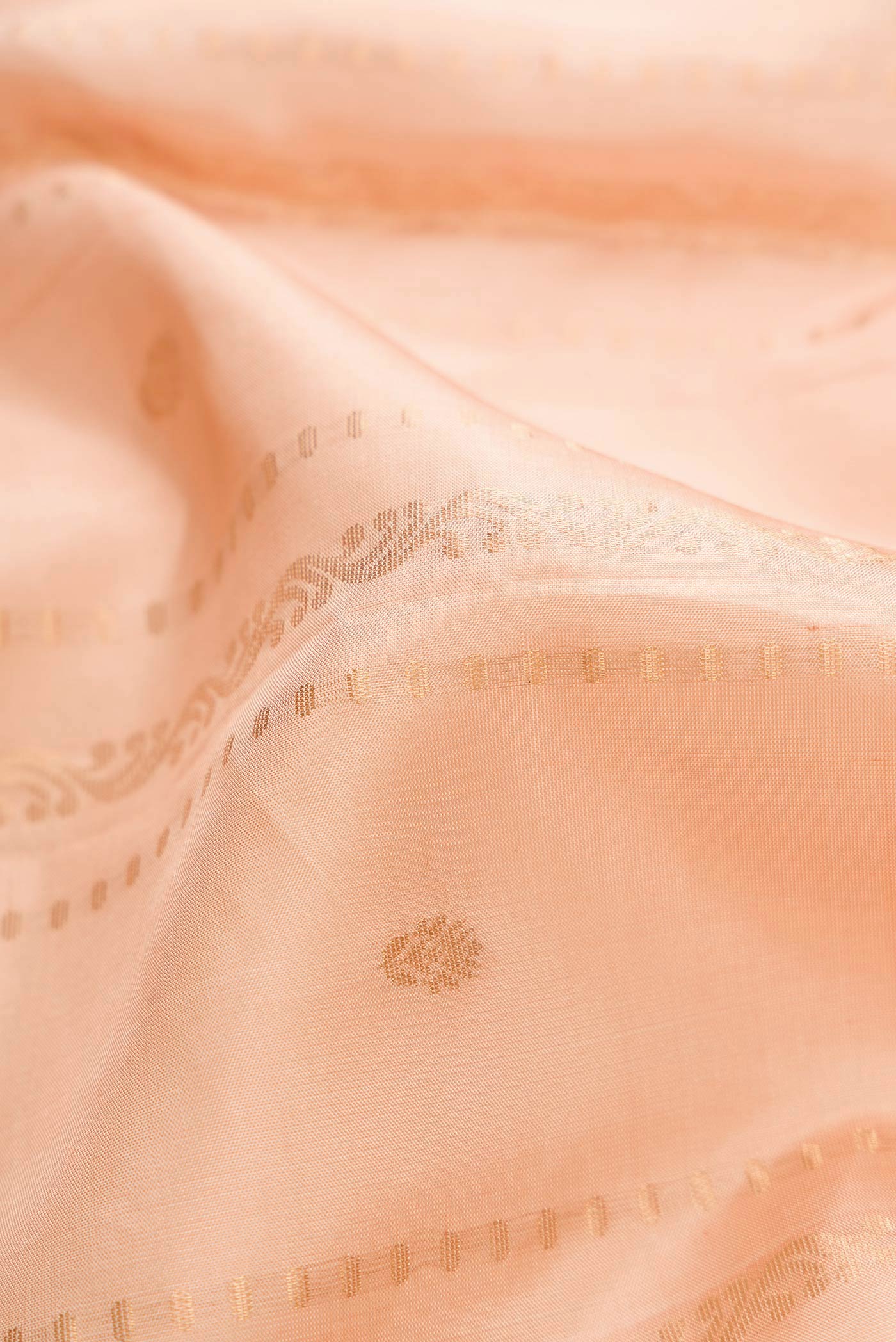 Close up of Sandal Dual Tone Soft Silk Saree with Zari Butta on the body and Zari Border displaying folds