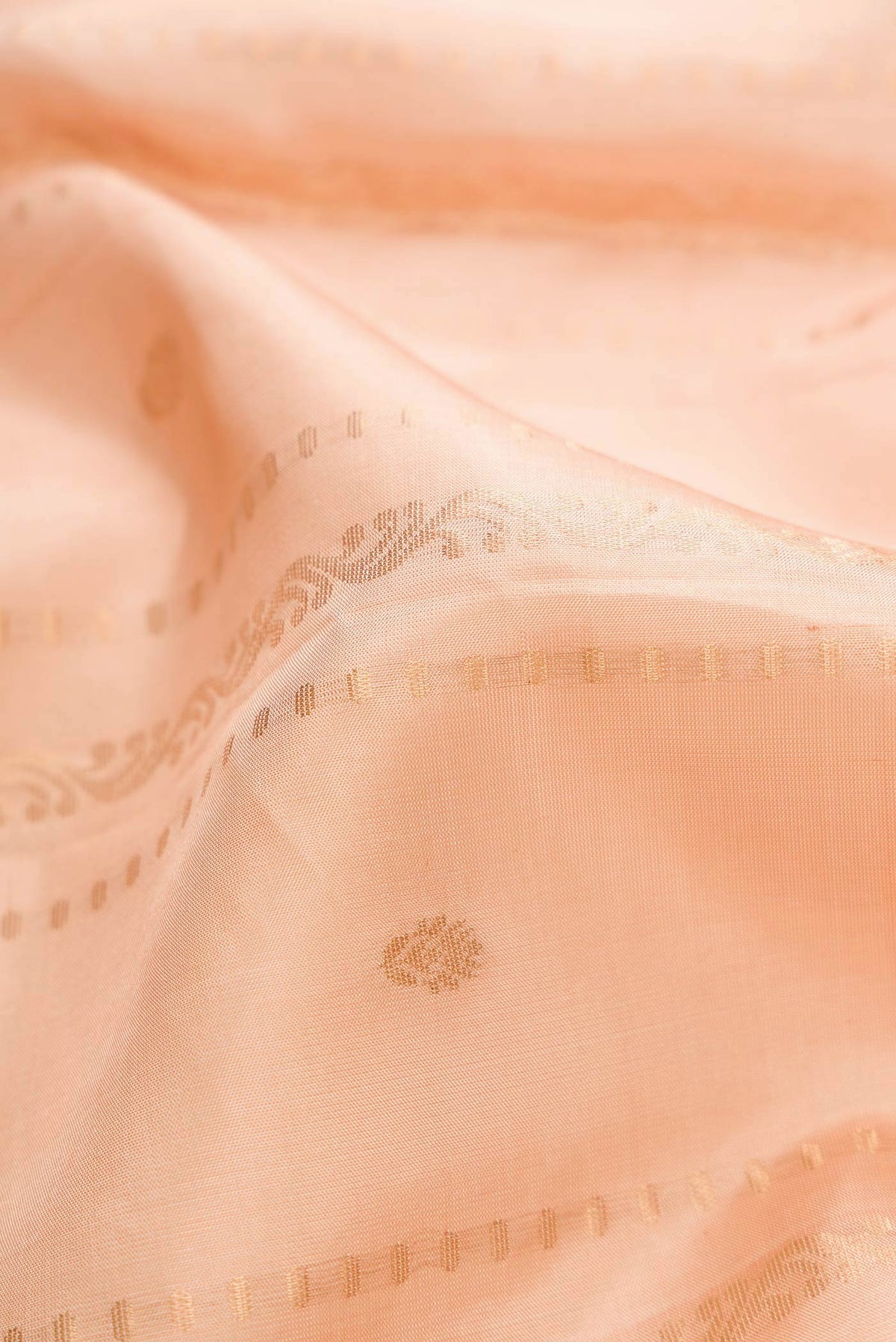 Close up of Sandal Dual Tone Soft Silk Saree with Zari Butta on the body and Zari Border displaying folds