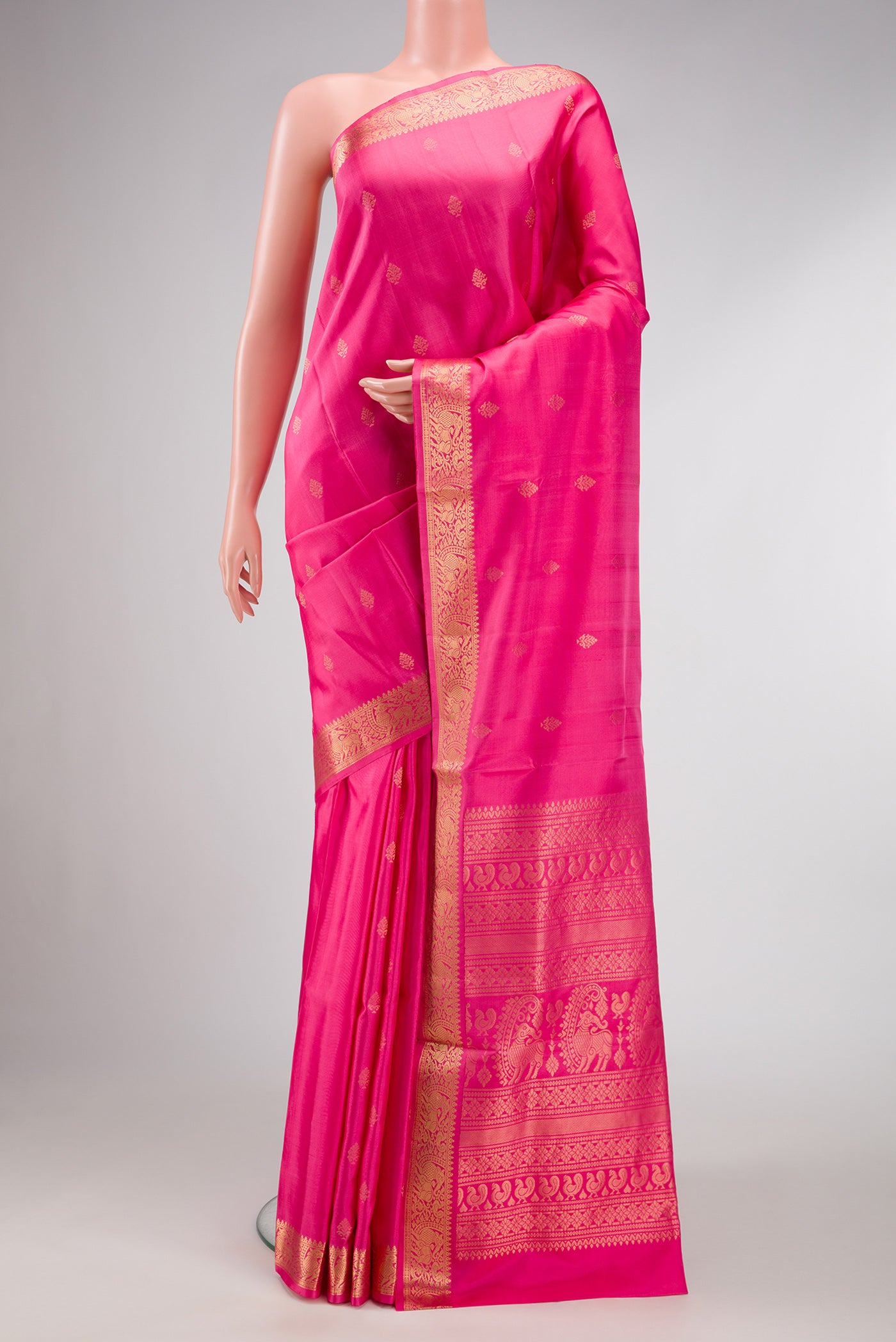 Pink Dual Tone Soft Silk Saree with Zari Butta on the body and Zari Border.  displayed on a mannequin