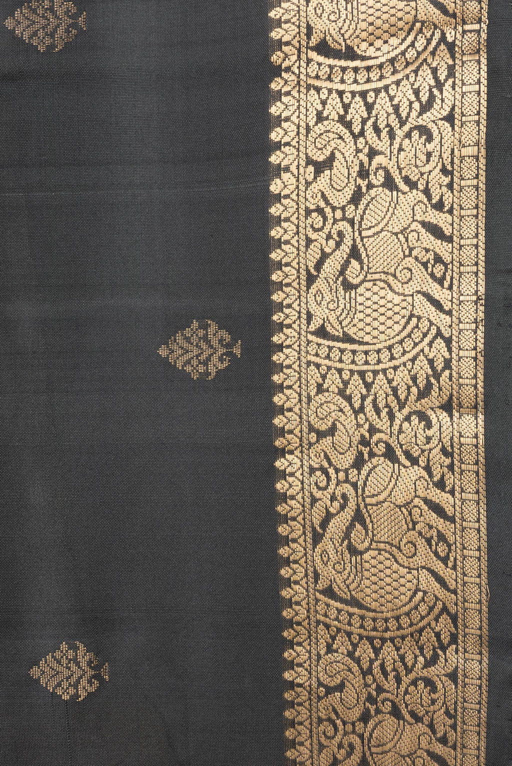 Border image of Black Dual Tone Soft Silk Saree with Zari Butta on the body and Zari Border. 