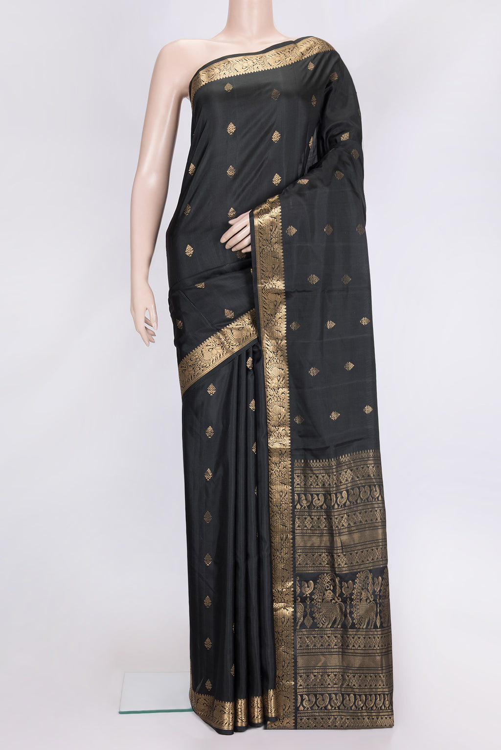 Black Dual Tone Soft Silk Saree with Zari Butta on the body and Zari Border.  displayed on a mannequin