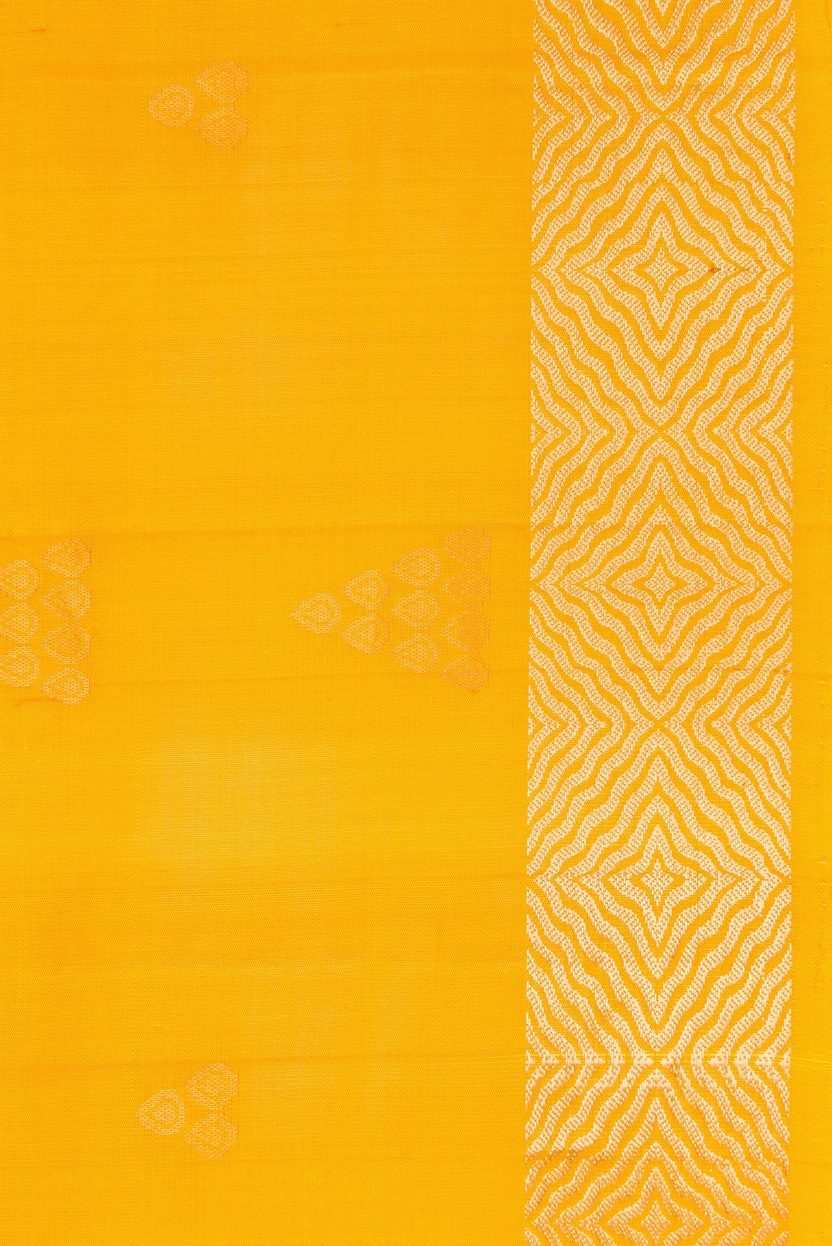 Border image of Yellow Dual Tone Soft Silk Saree with Zari Butta on the body and Zari Border. 